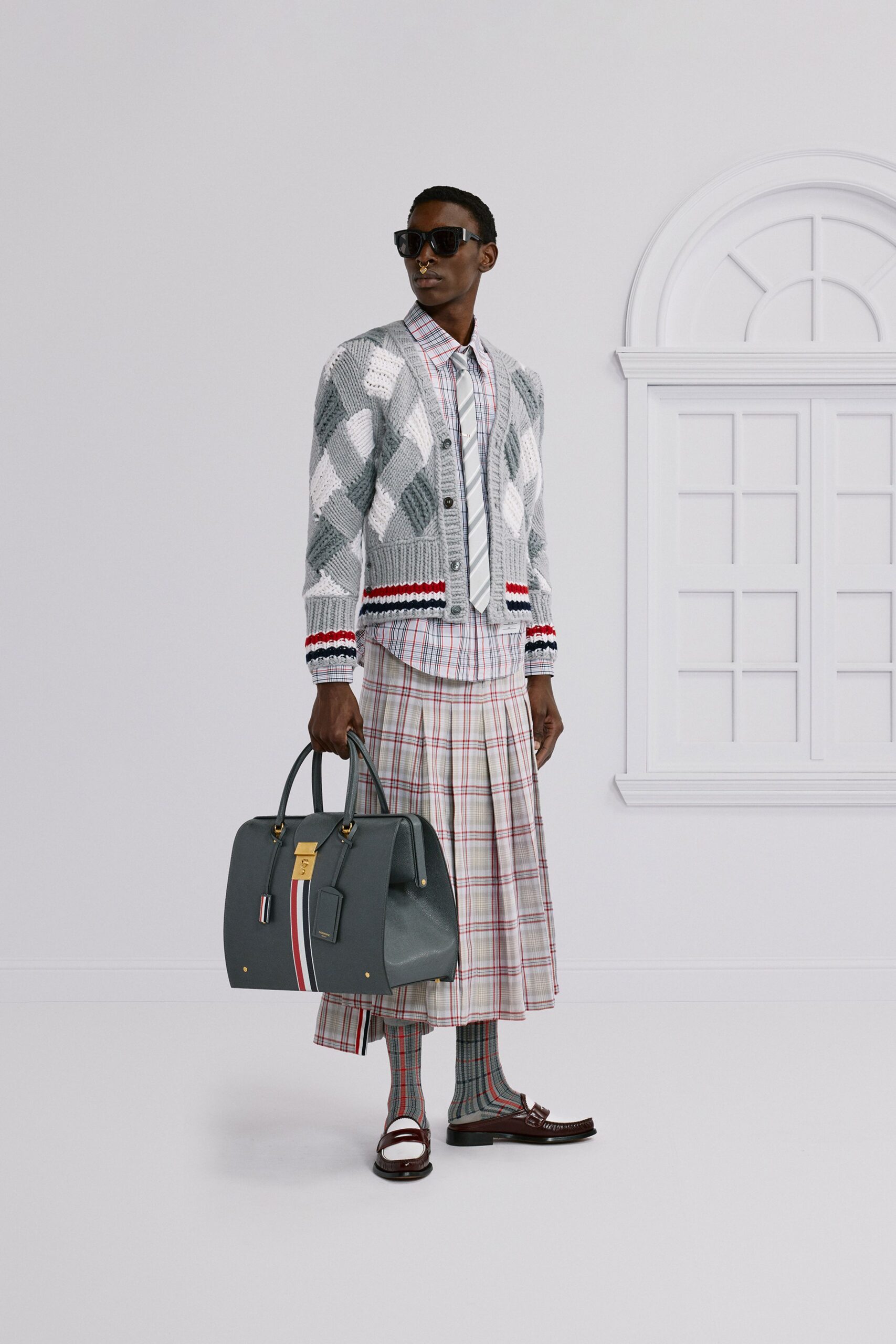 gray cardigan with plaid shirt and midi skirt