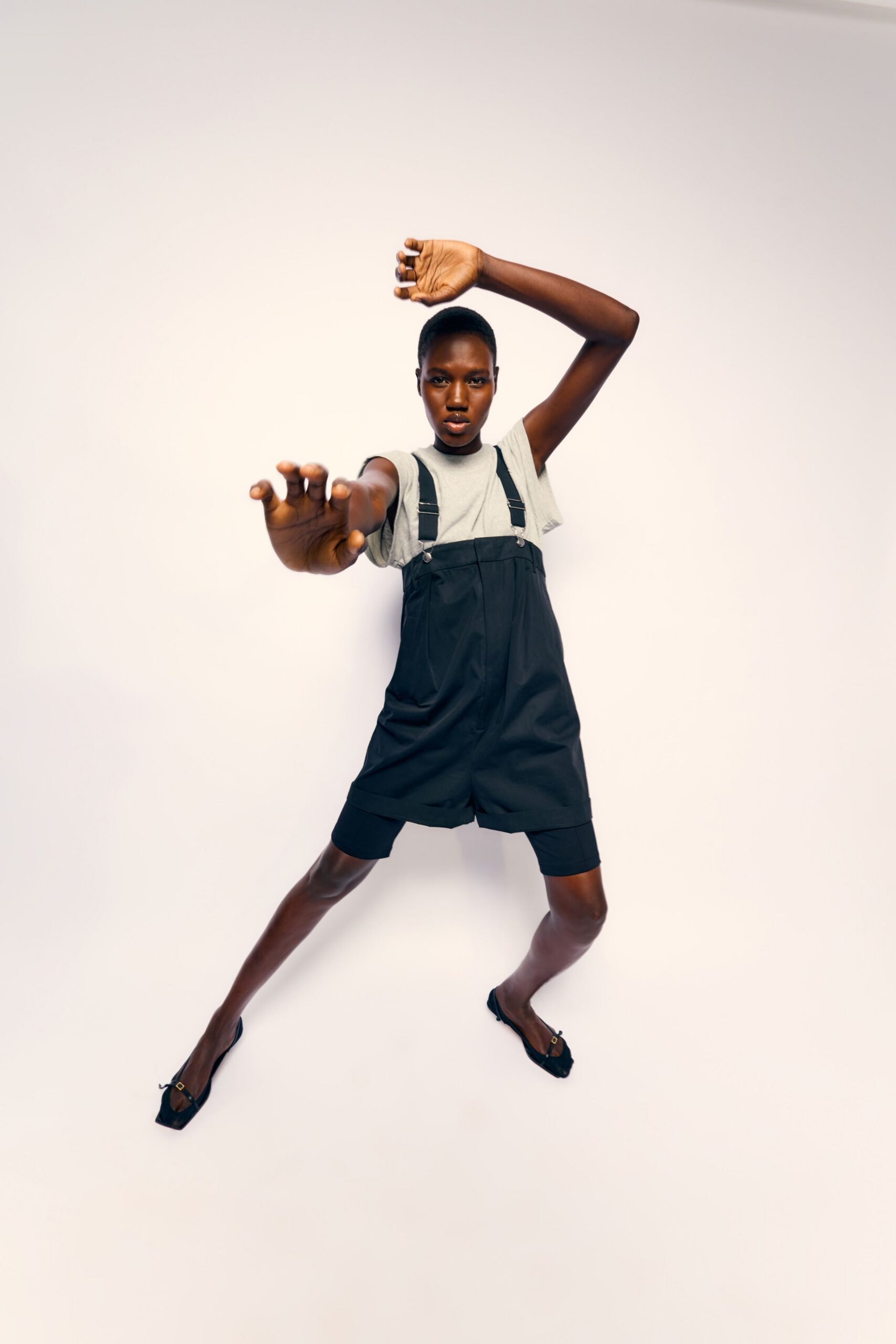 black cotton sleeveless relaxed pockets romper
