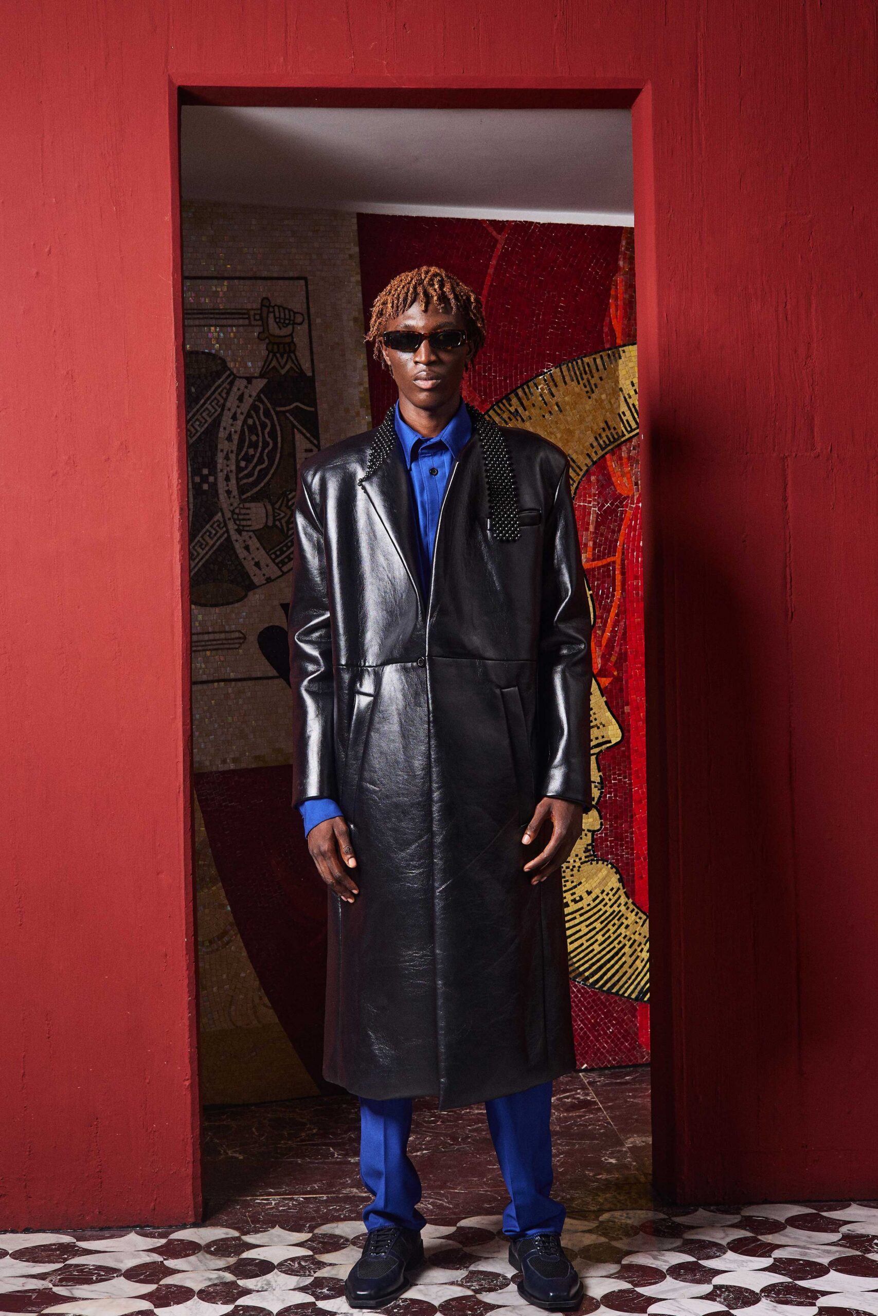 black leather coat with blue shirt