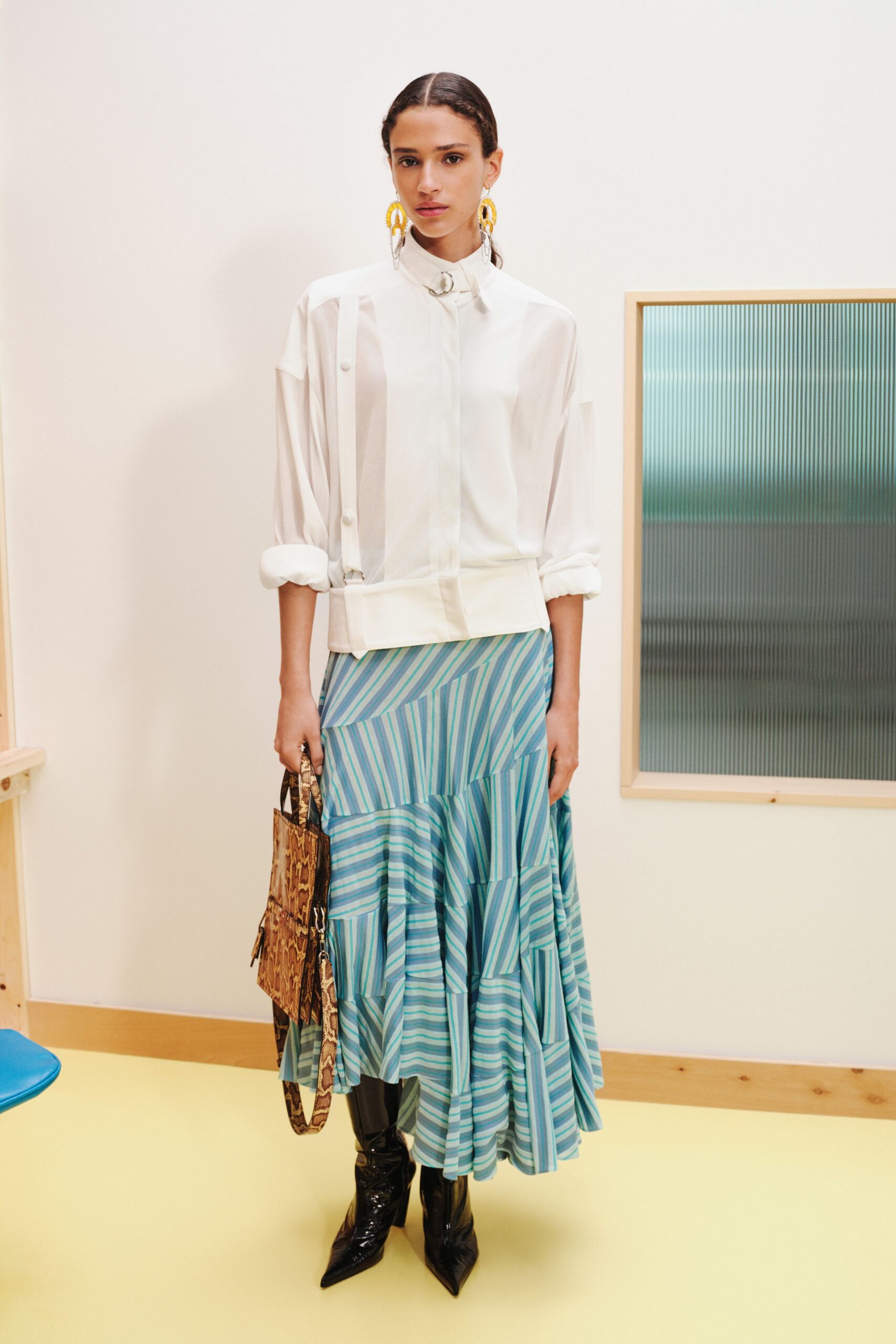 white relaxed shirt with blue tiered skirt