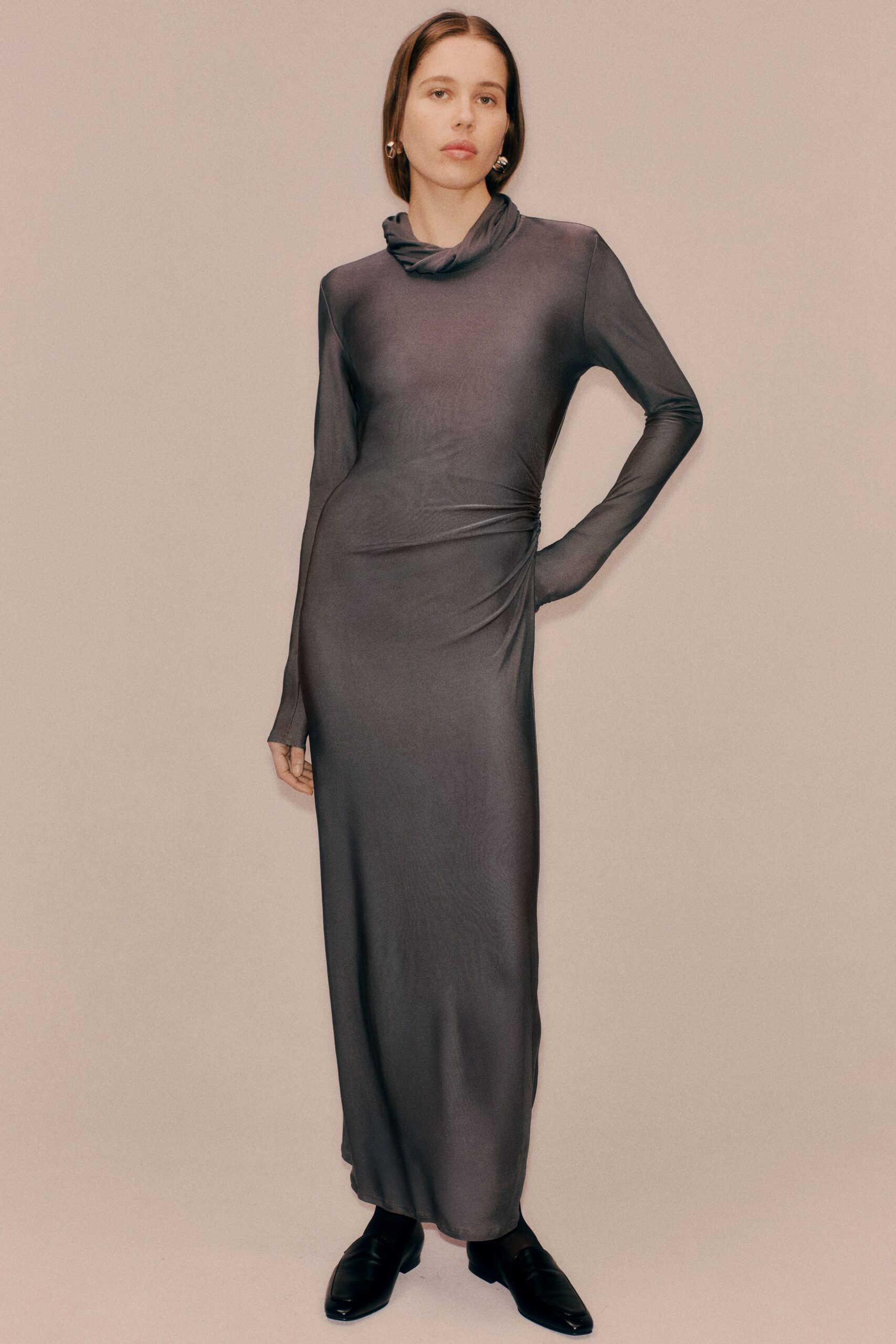 gray silk long-sleeve high-neck fitted ruched sheer gown