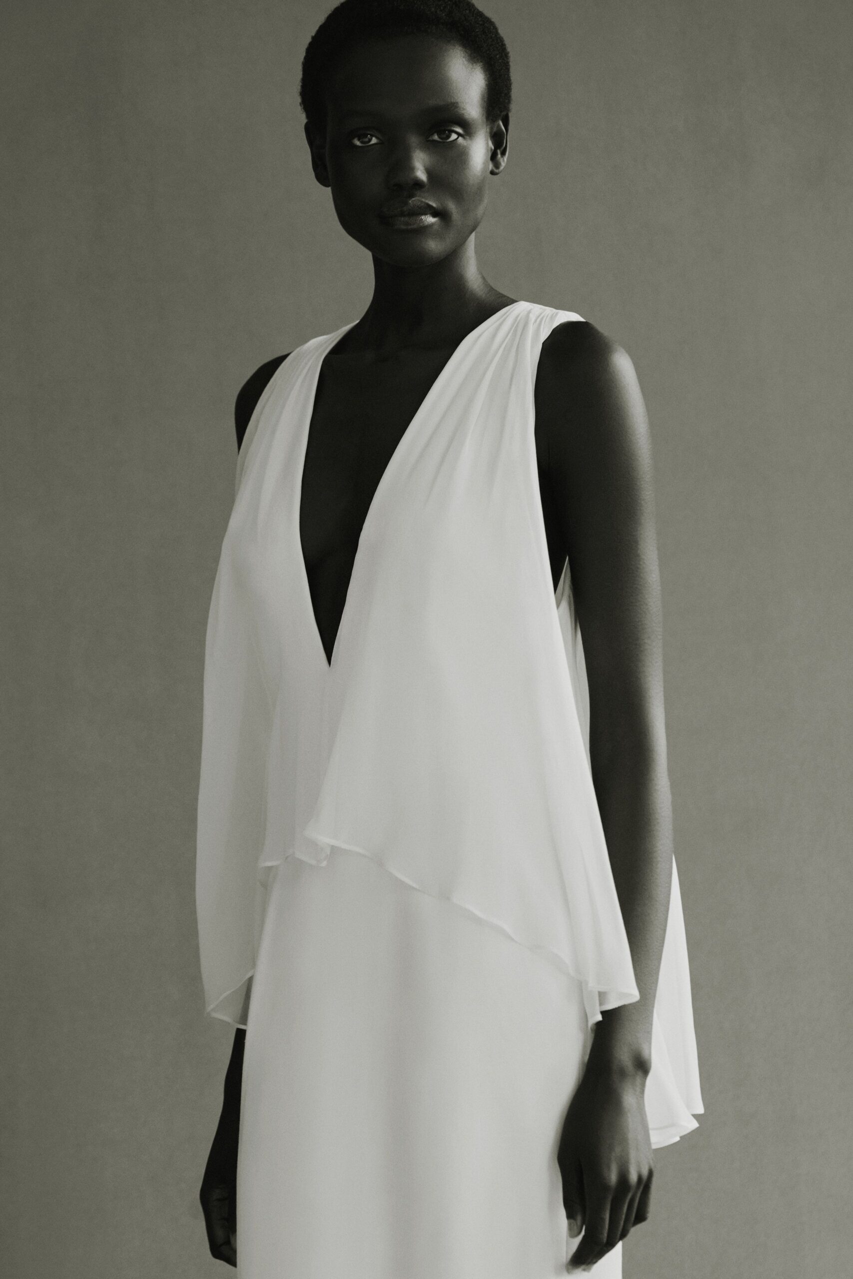 white silk sleeveless dress
