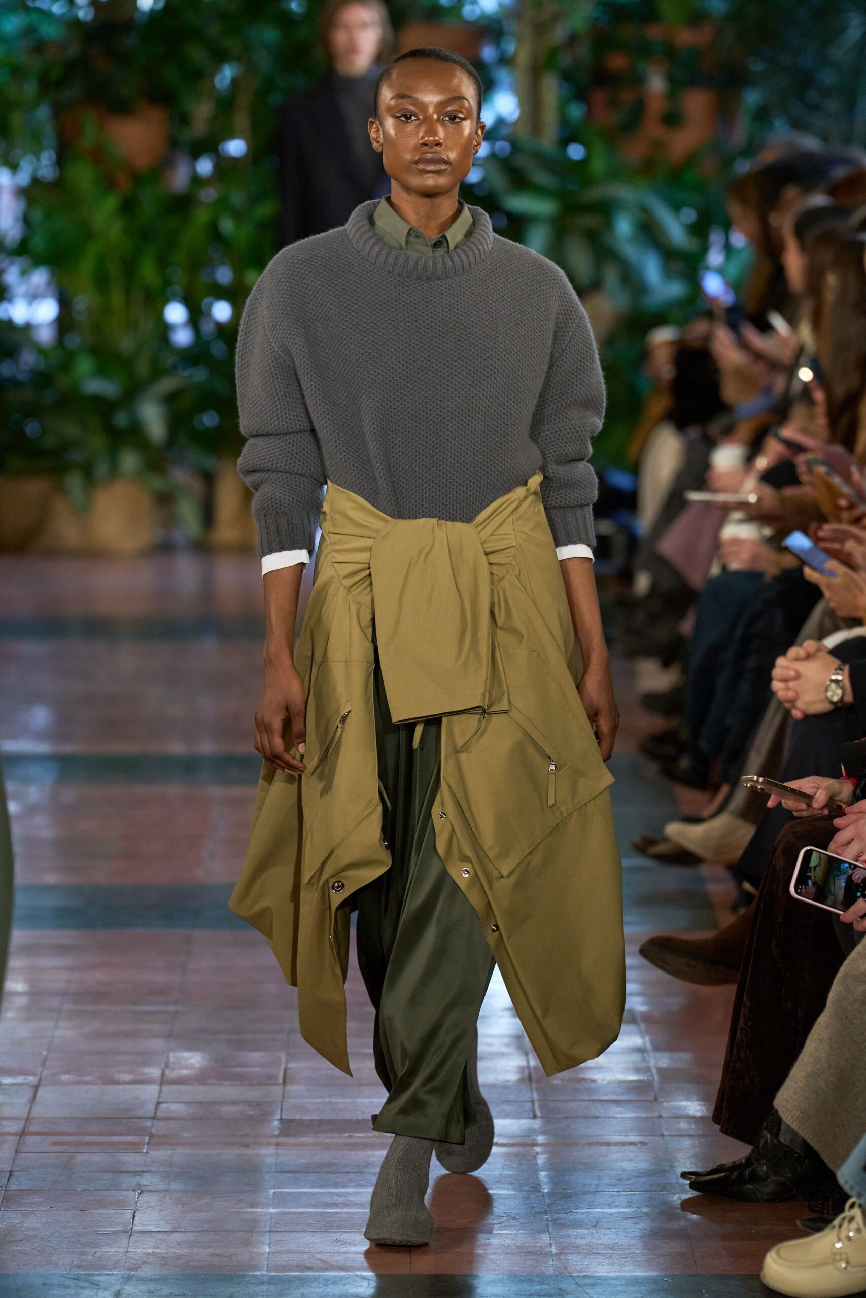 gray wool sweater with green coat