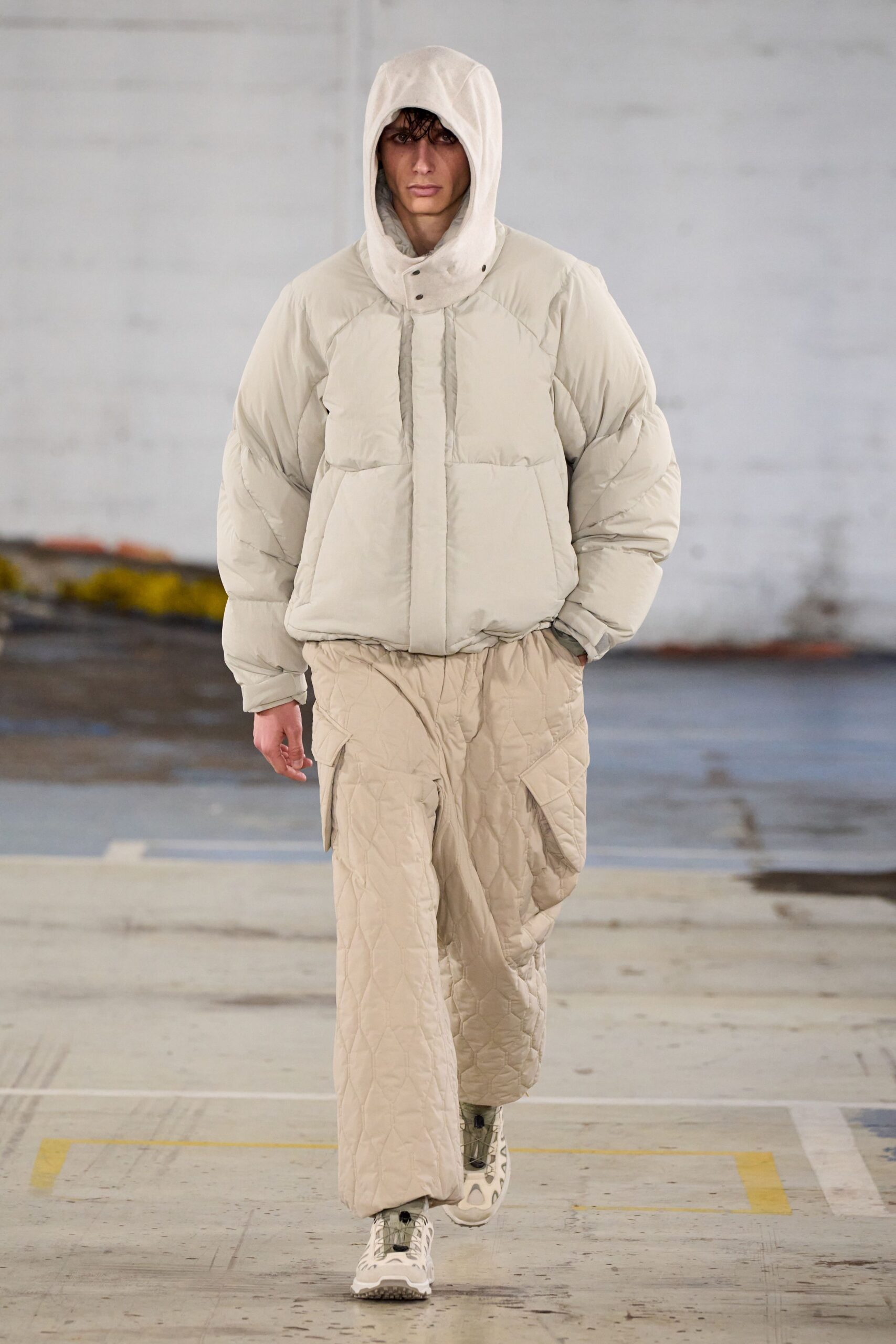 white quilted jacket beige pants