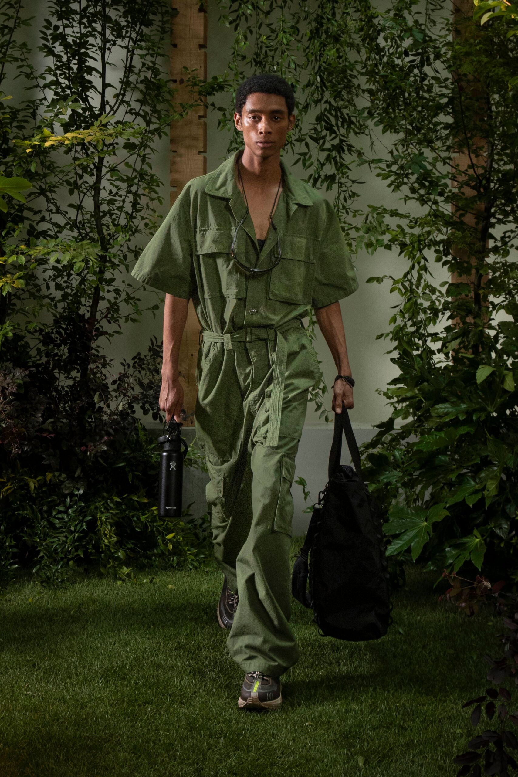 green relaxed jumpsuit with accessories