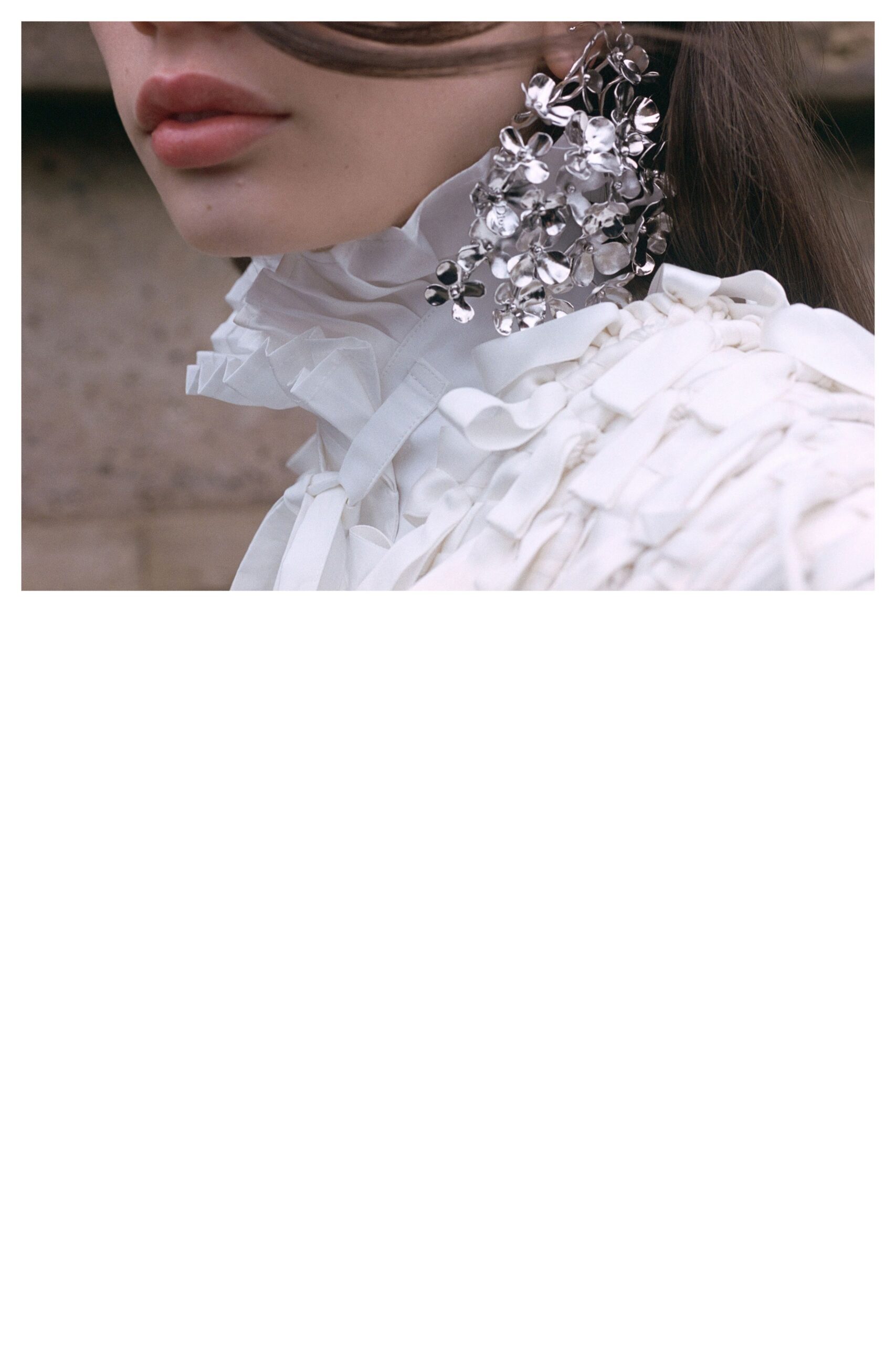 white silk ruffled blouse