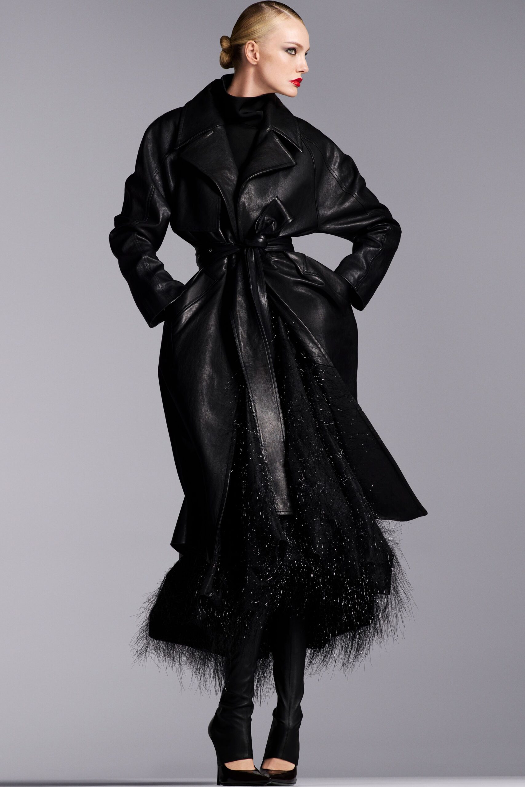 black leather long-sleeve collared fitted belted draped coat