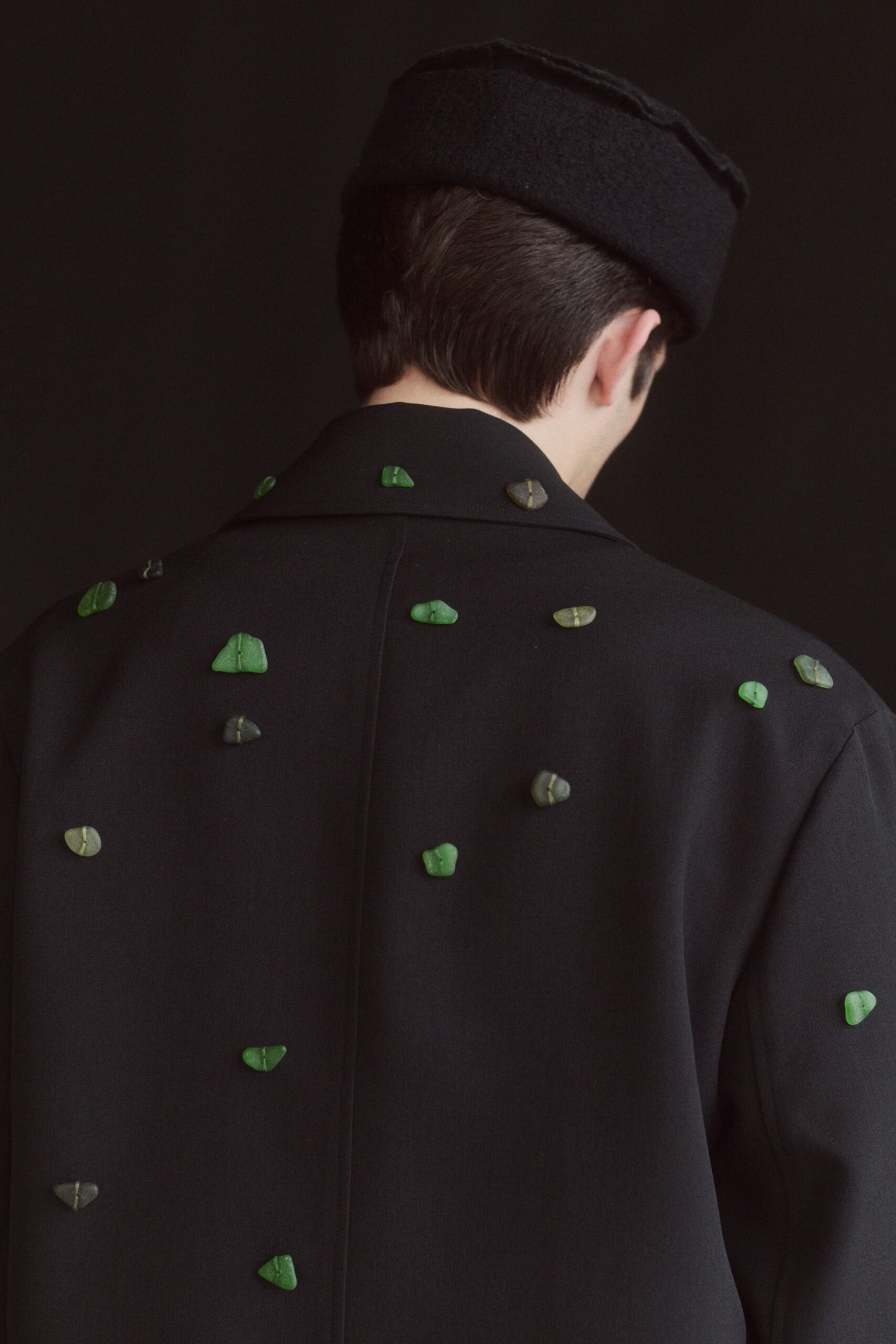 black wool coat with embellishments