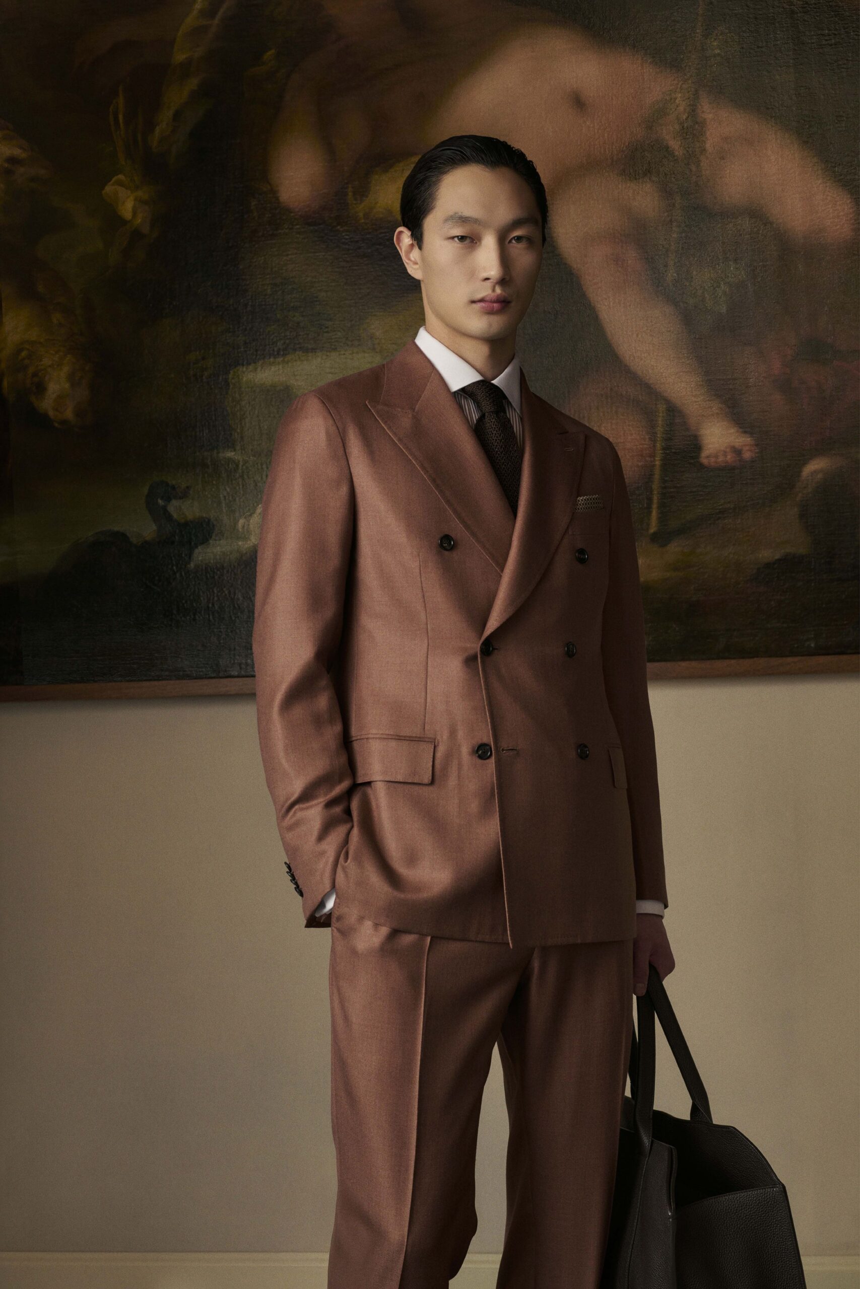brown tailored suit with bag