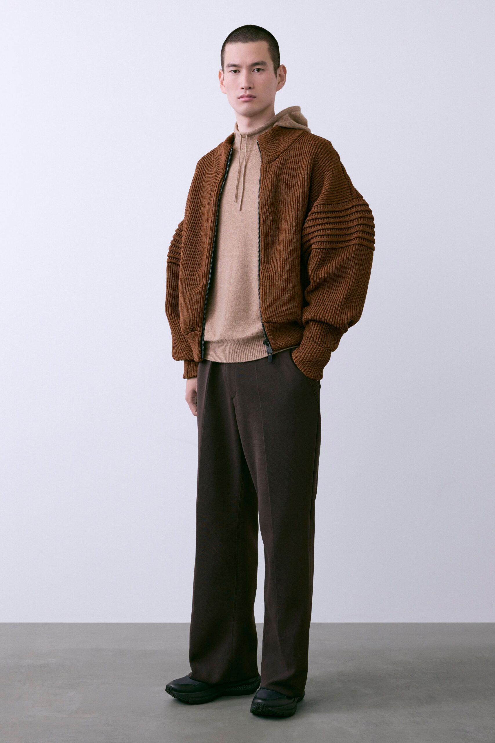 brown relaxed jacket with beige hoodie
