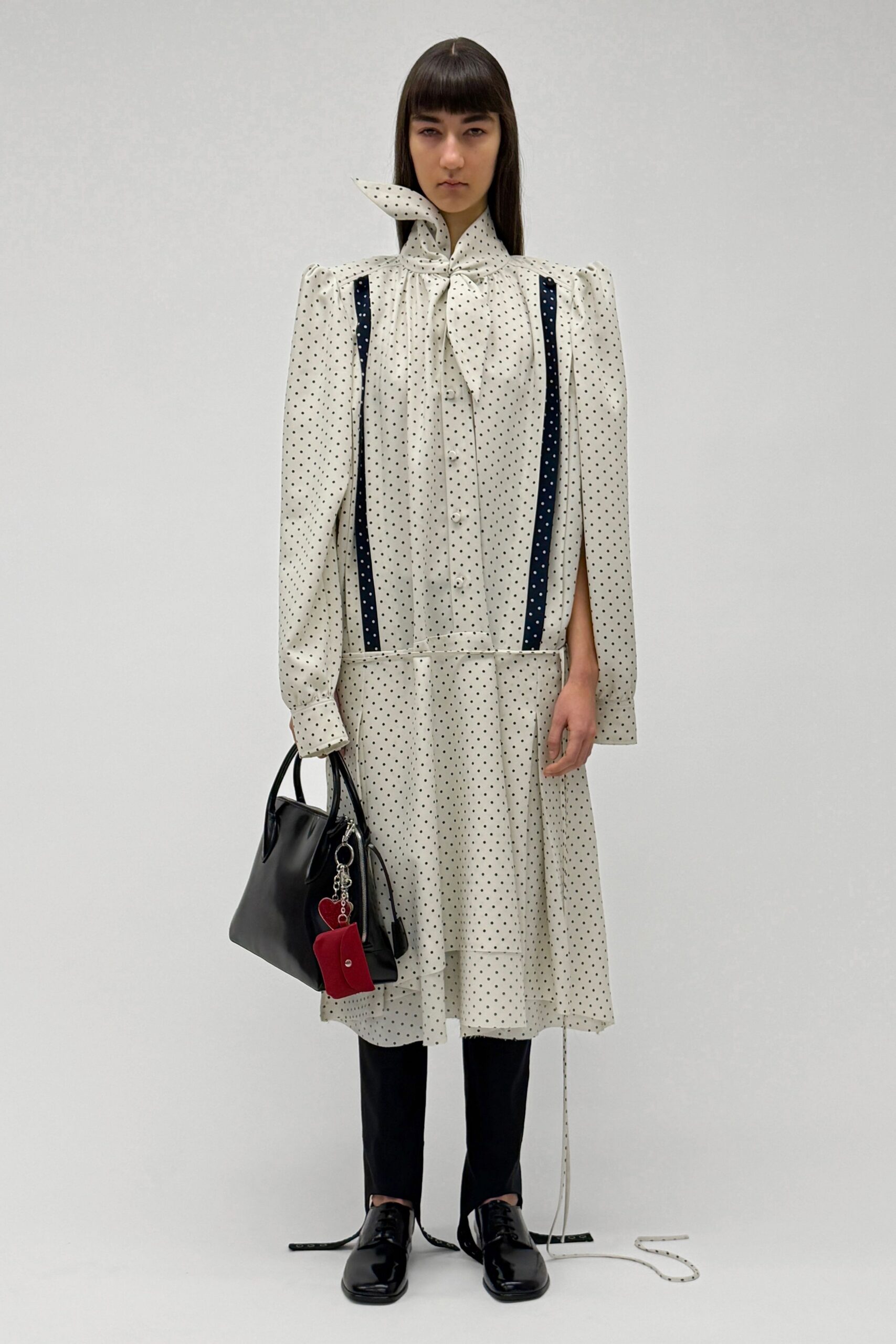 white polka-dot midi dress