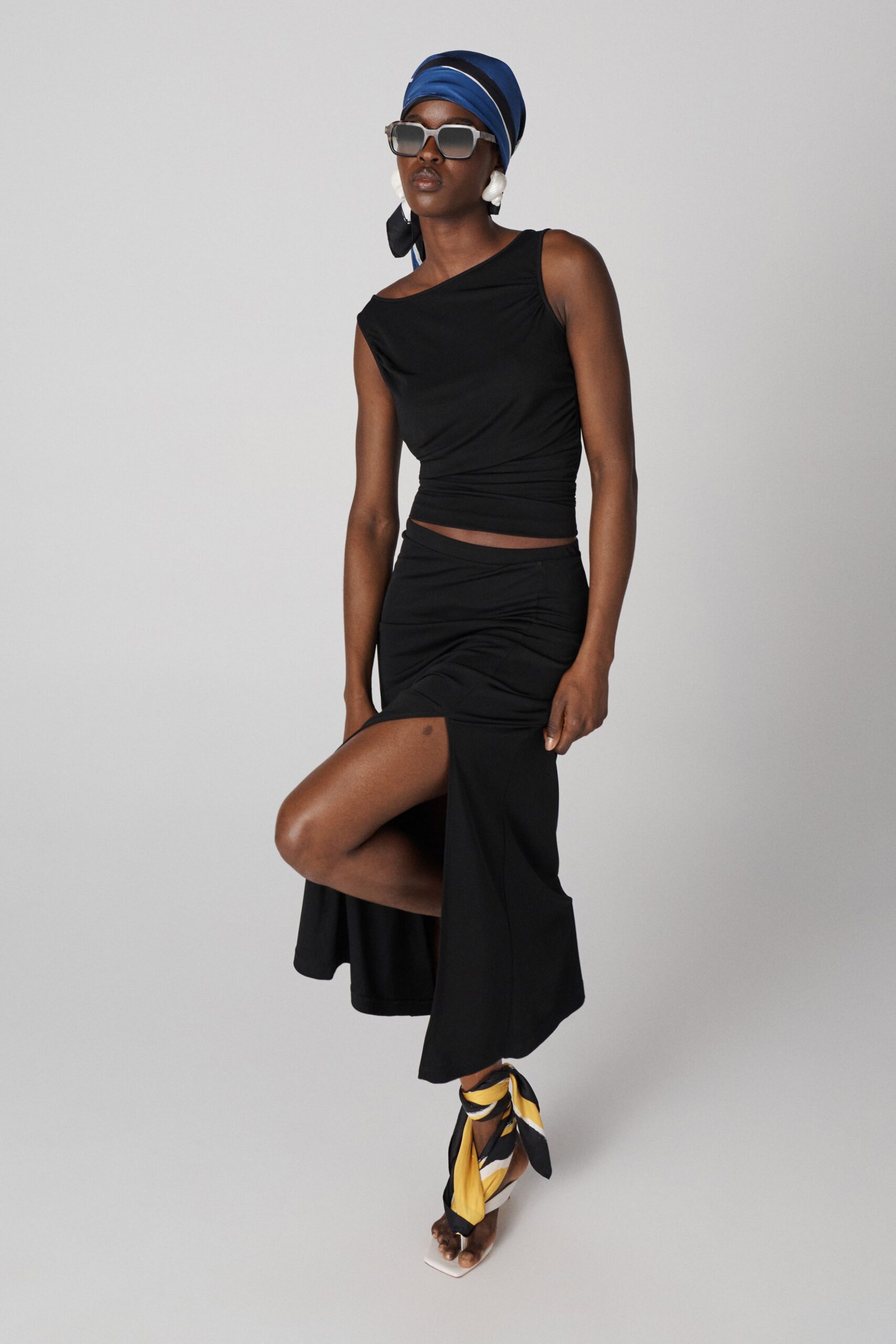 black fitted top and skirt