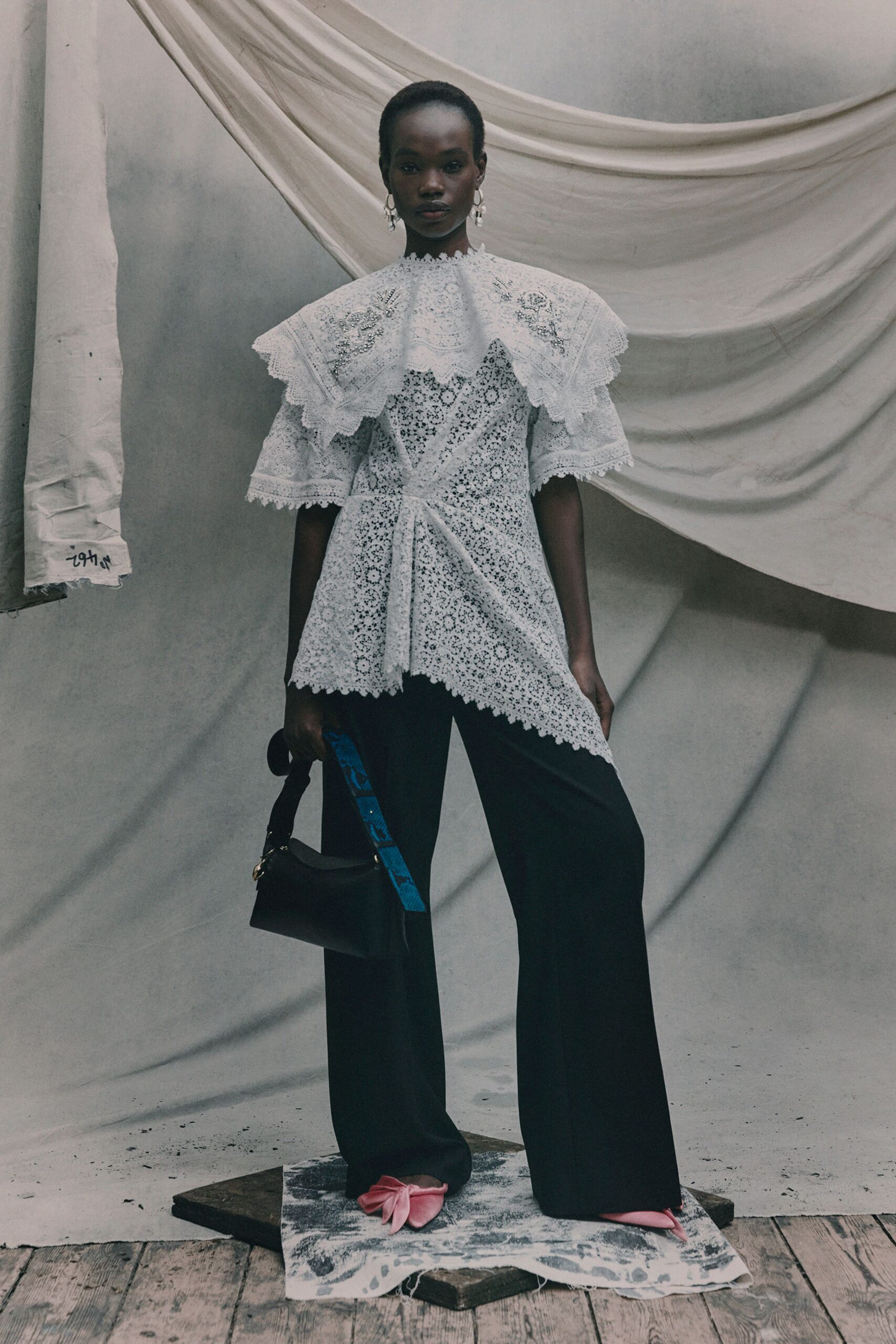 white lace short-sleeve high-neck fitted ruffled embroidered top