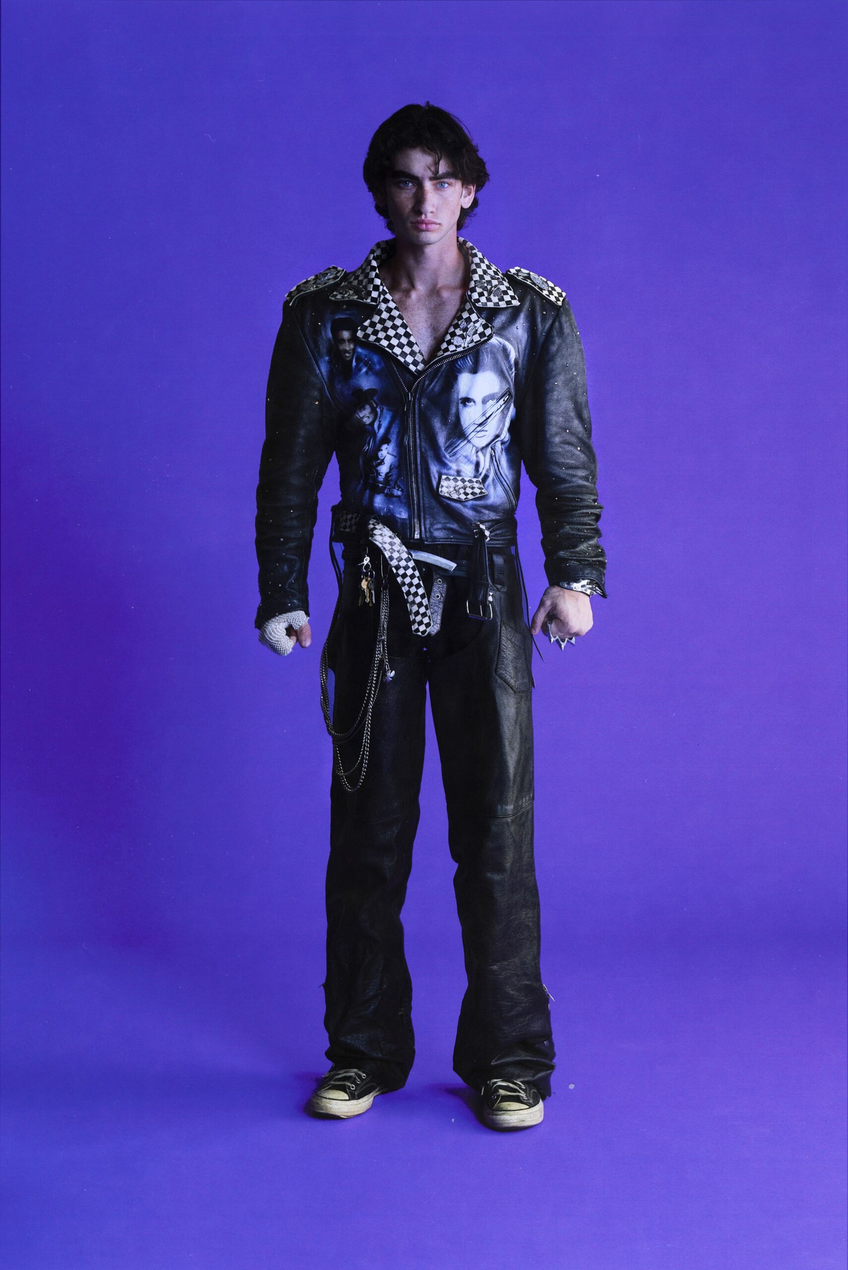 black leather long-sleeve collared fitted zippered embroidered jacket