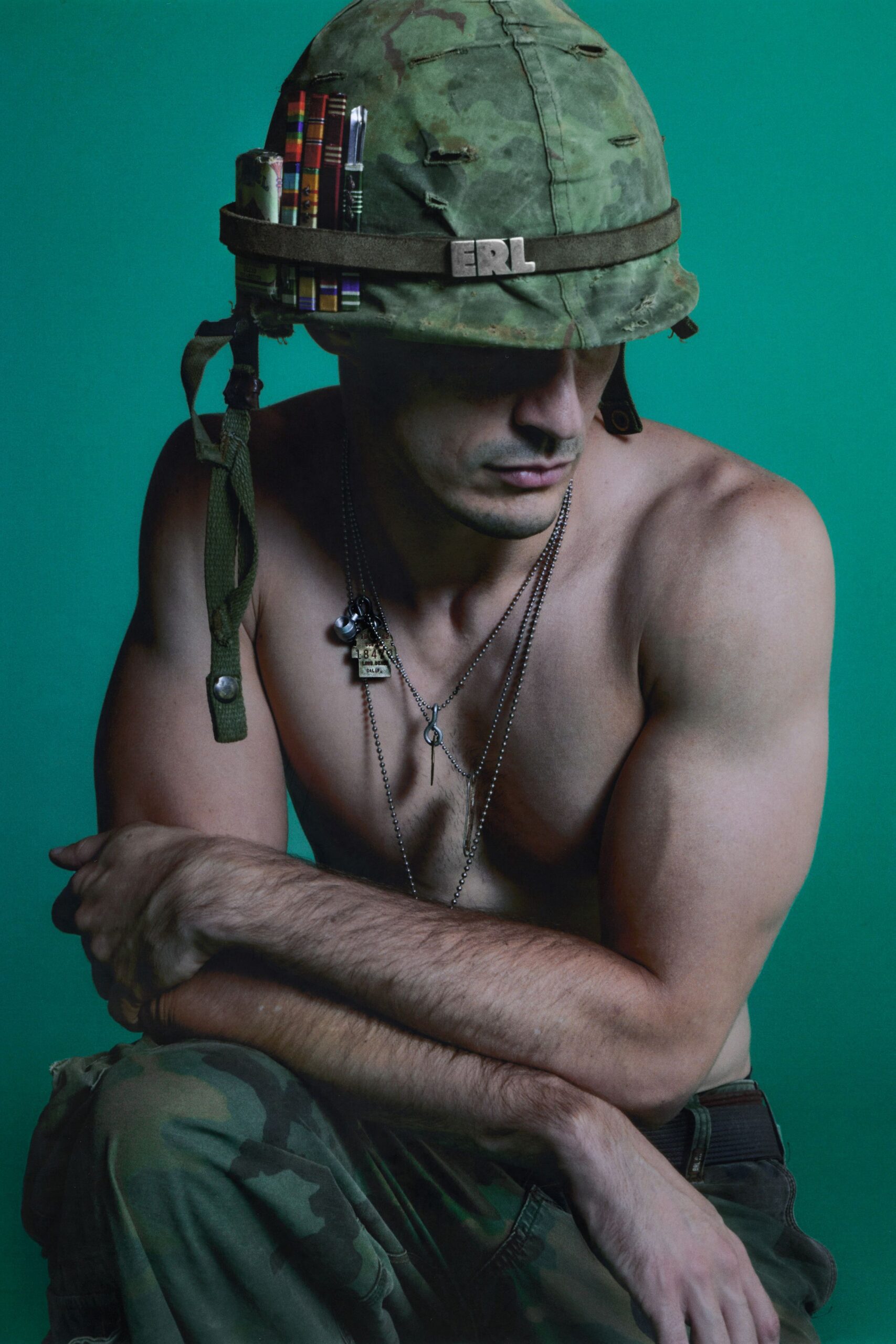 green camouflage pants and hat