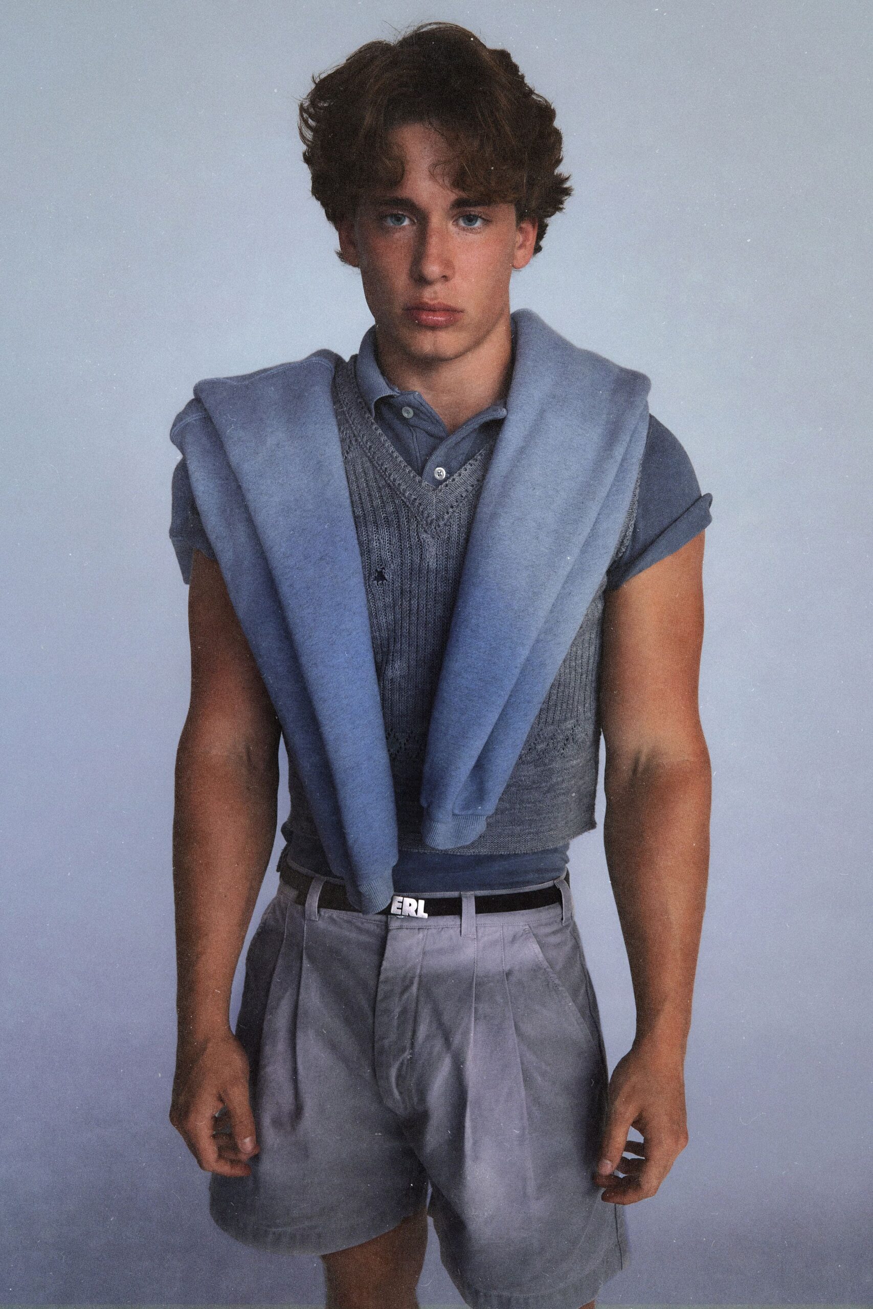 blue sweater gray vest outfit