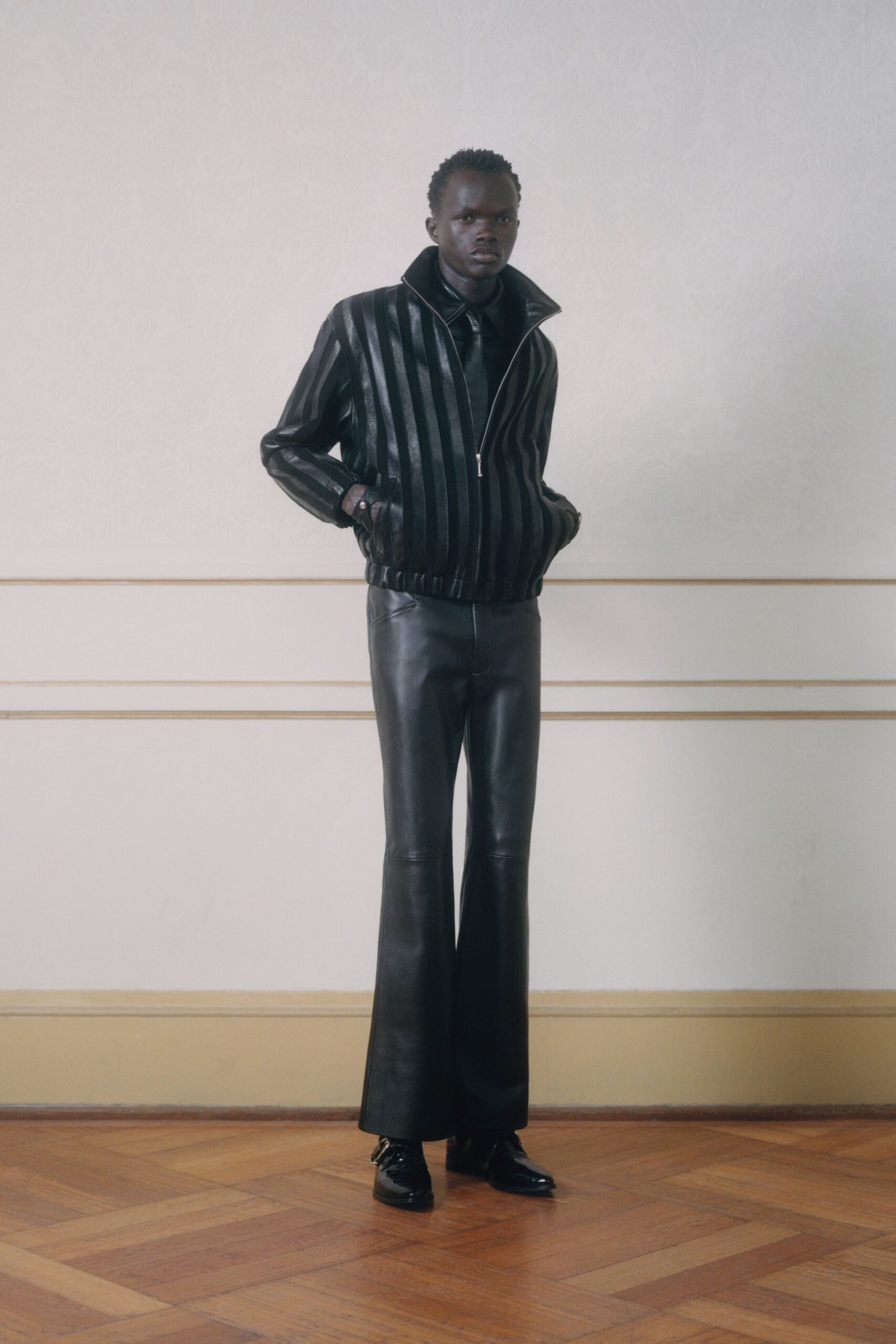 black leather fitted jacket and pants