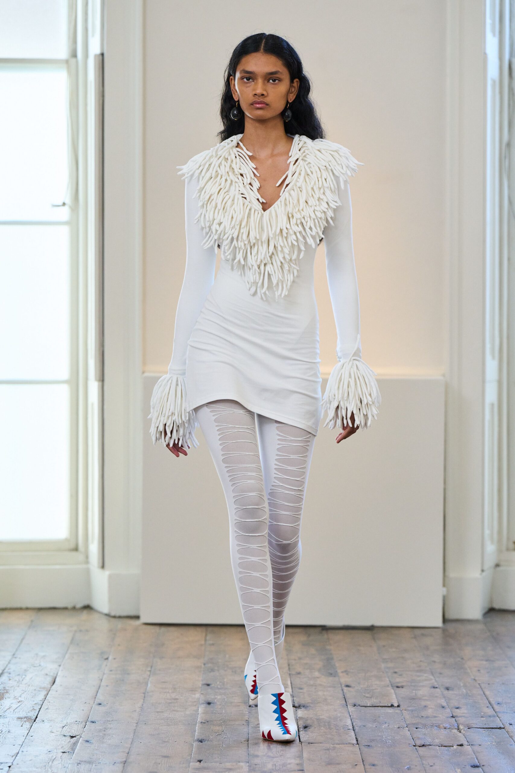 white fringed mini dress with shoes