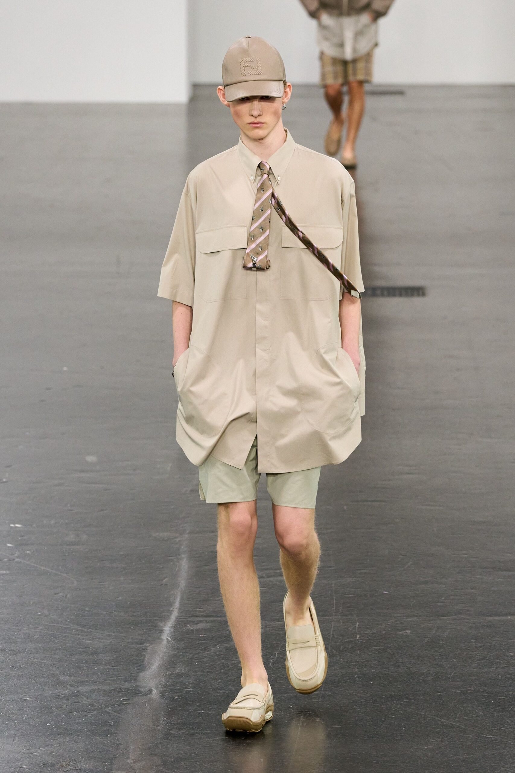 beige shirt with green shorts