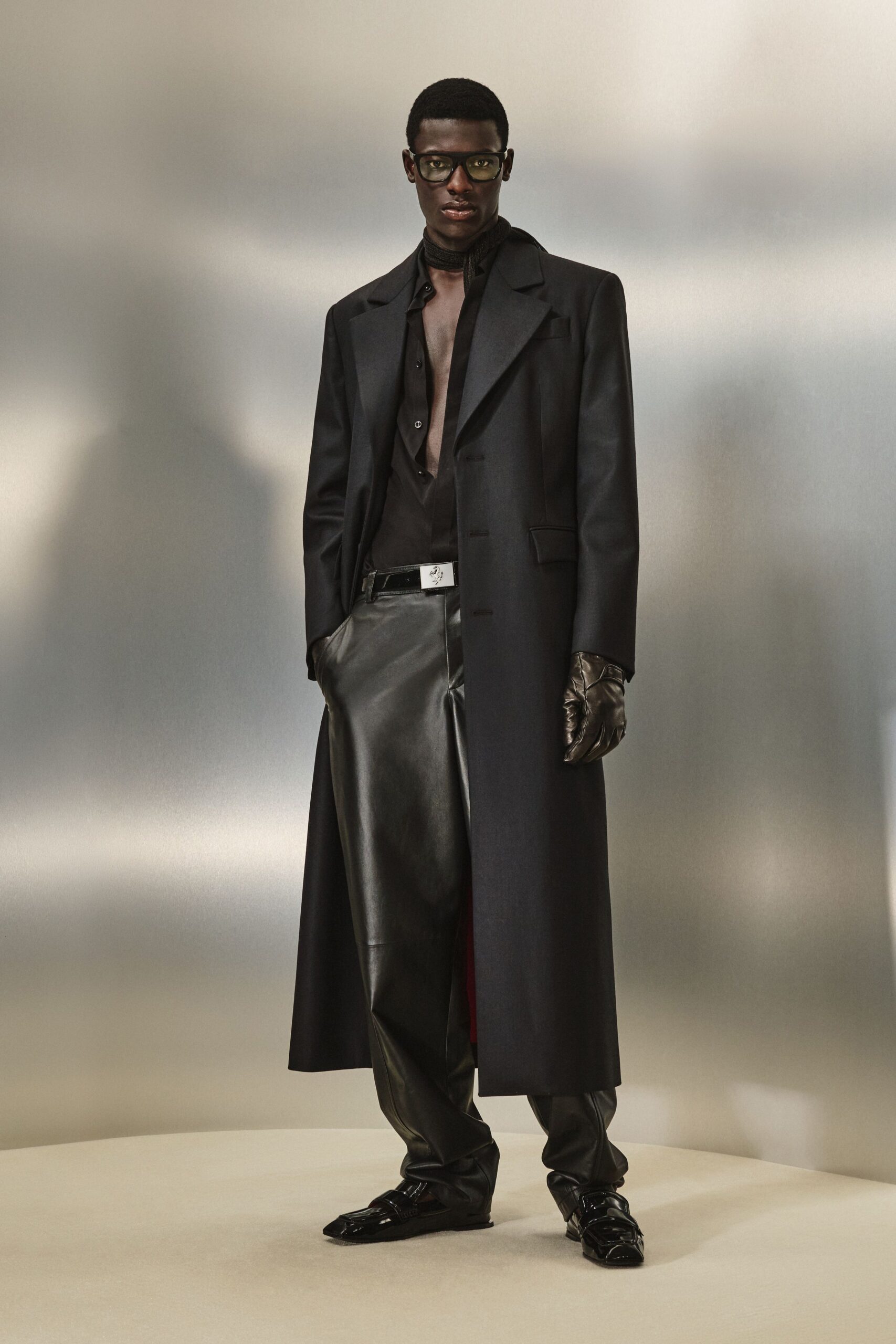 black wool coat with leather pants
