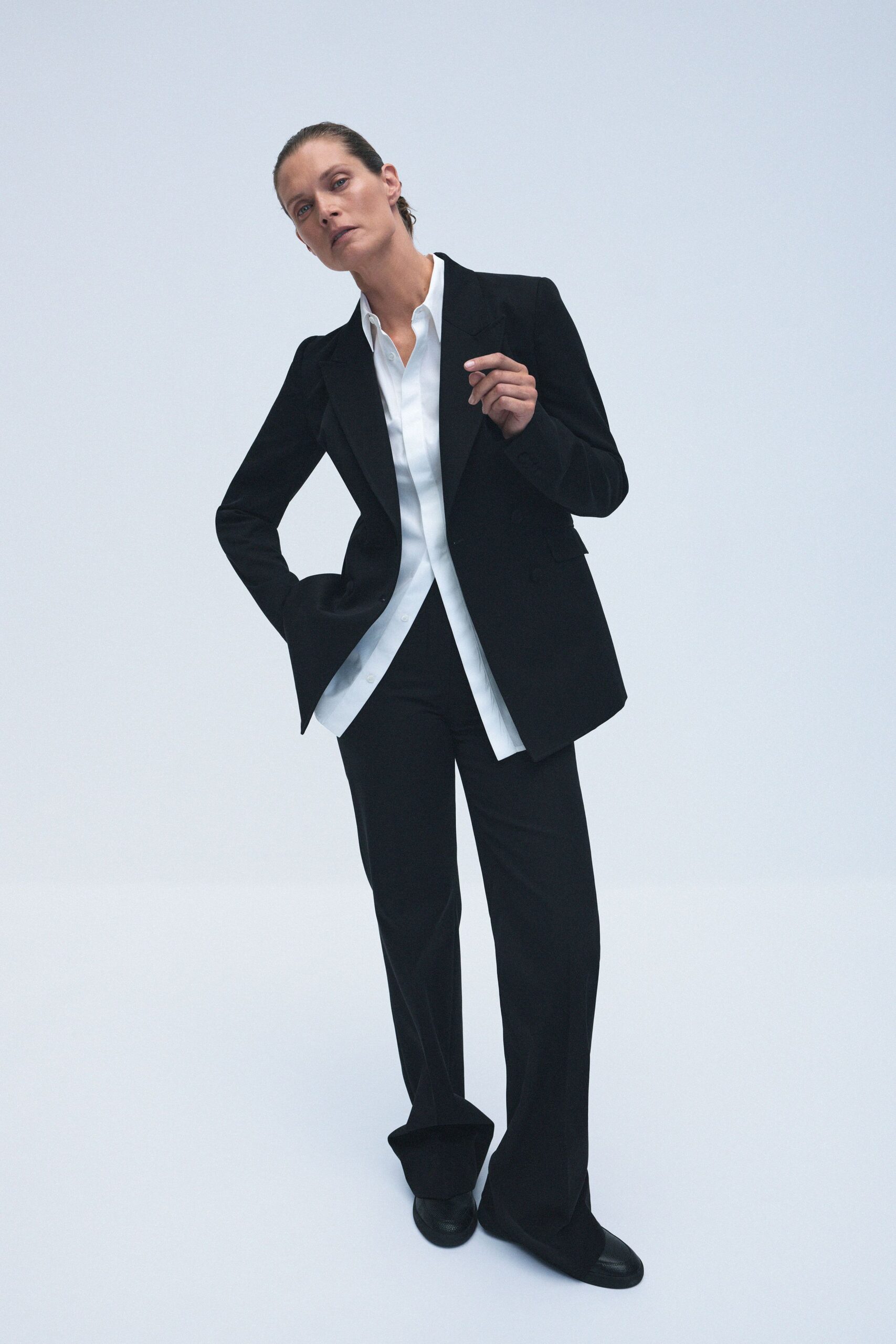 black tailored blazer with white shirt