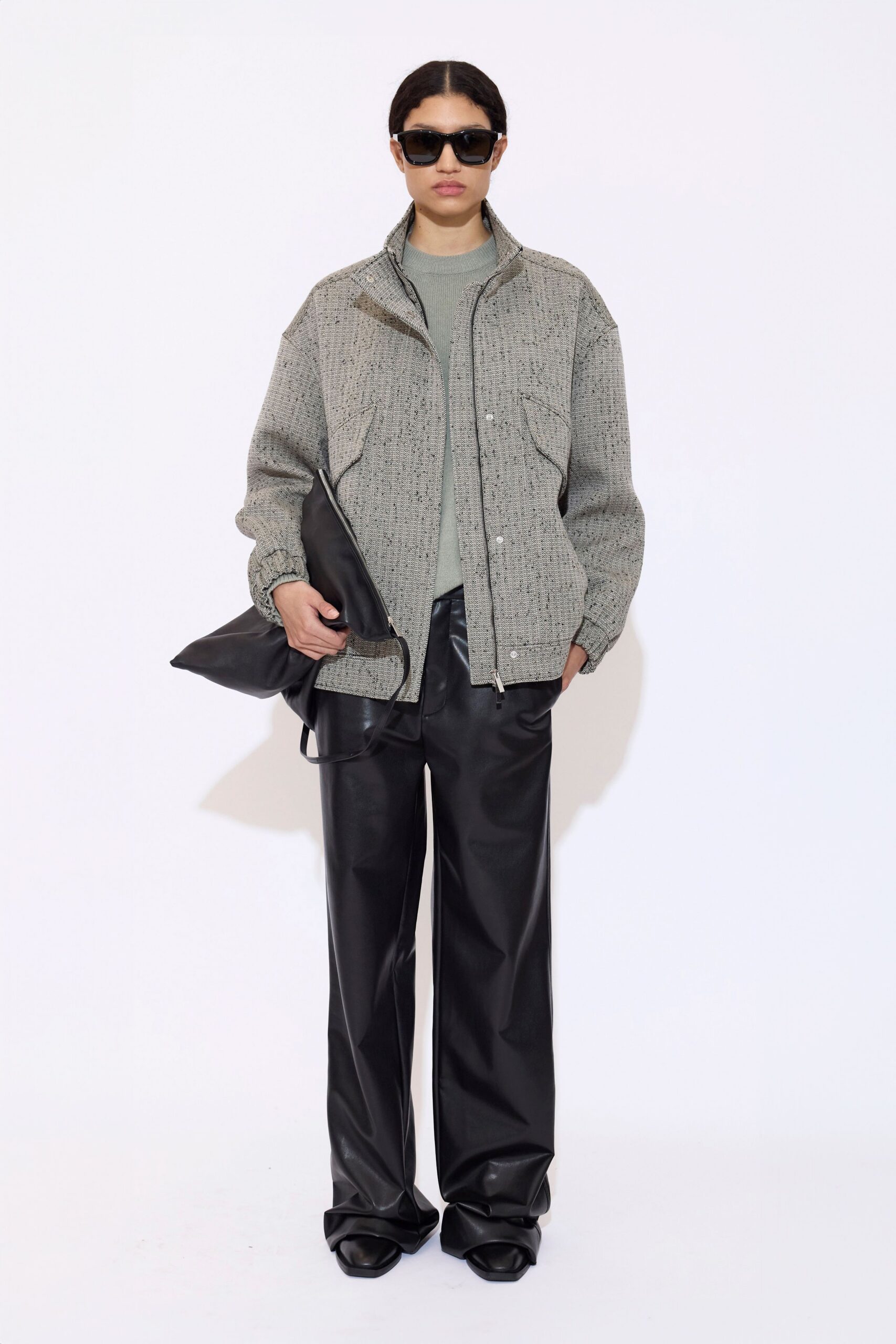 gray relaxed jacket with black leather pants