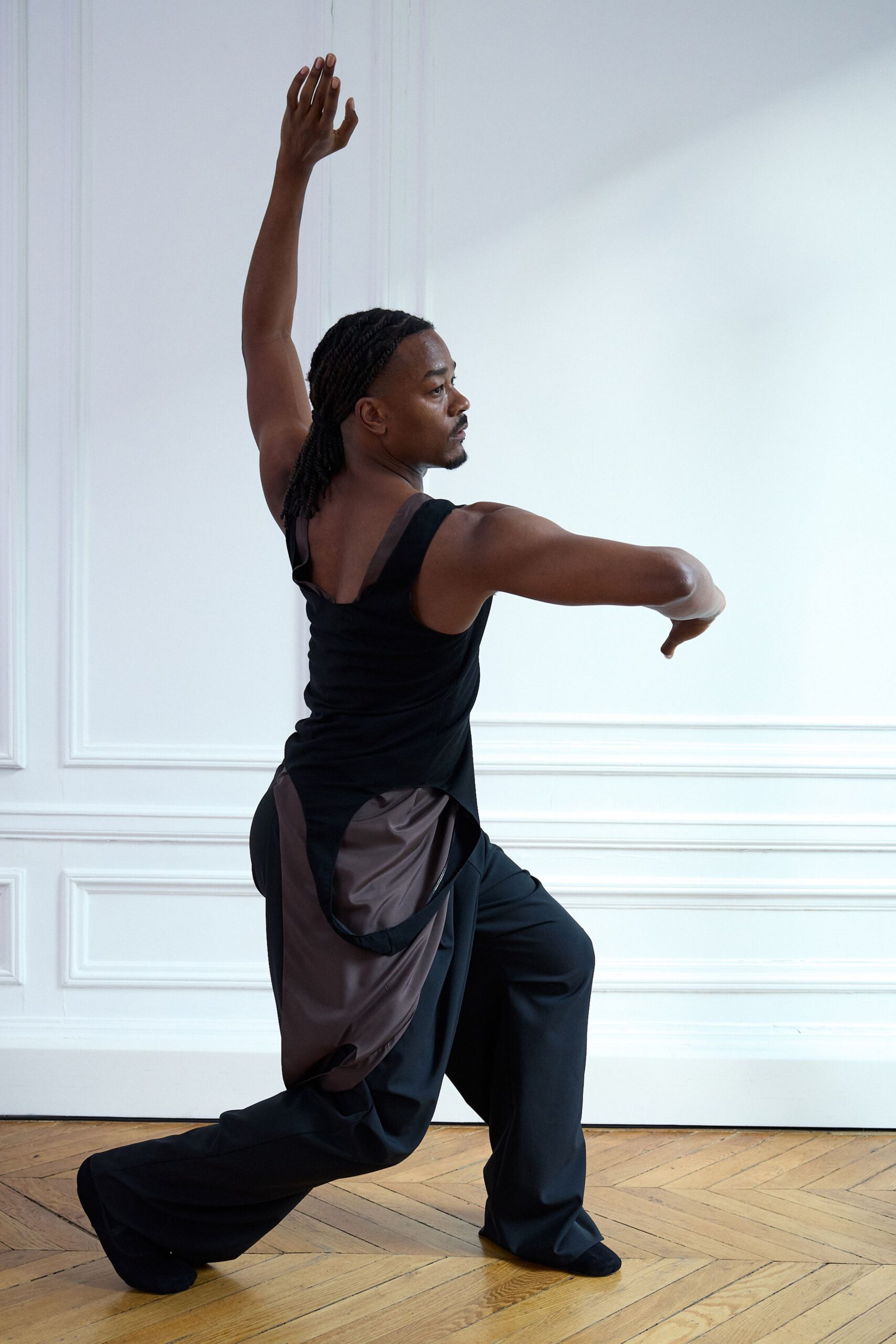 black fitted top and relaxed pants
