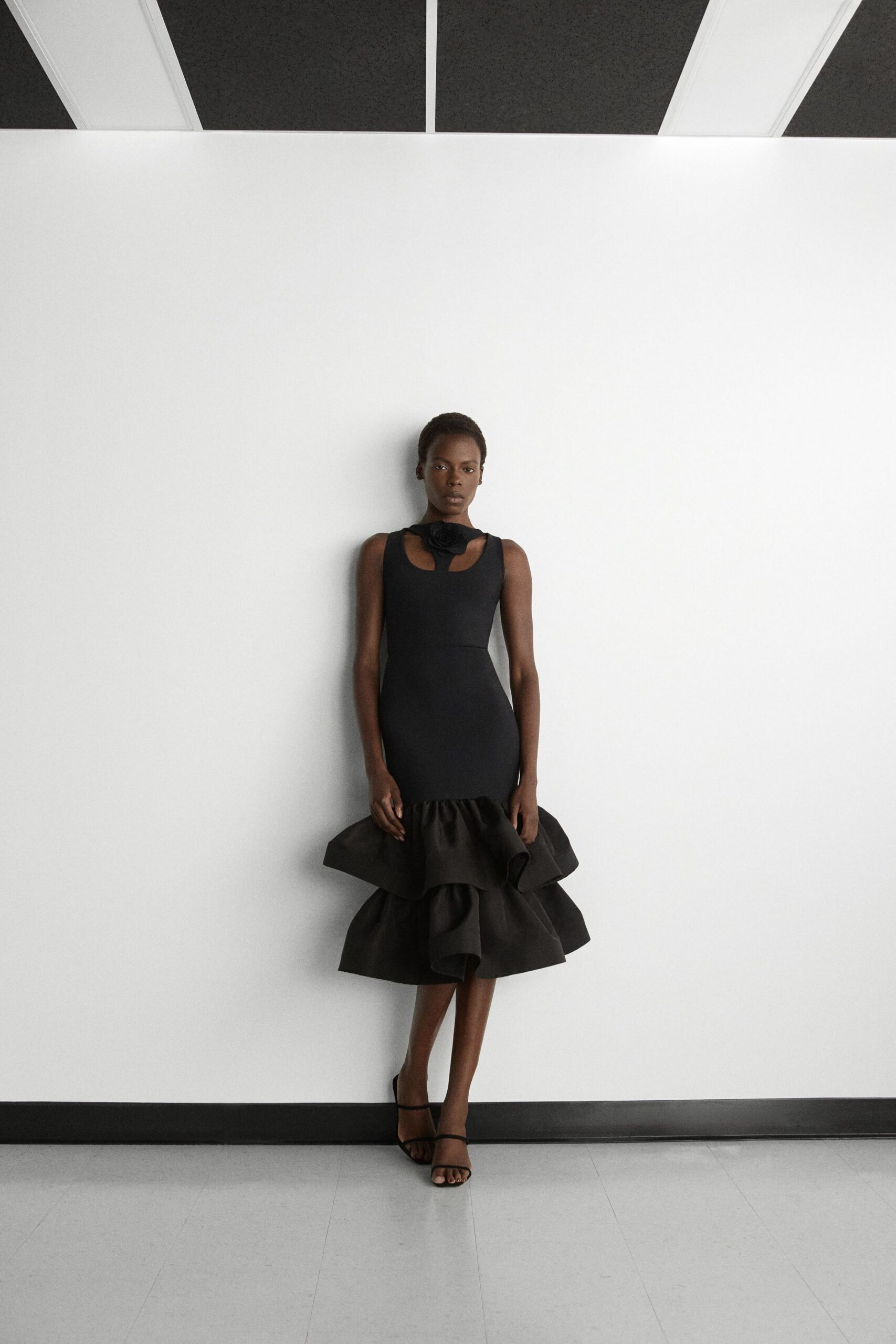 black fitted ruffled dress