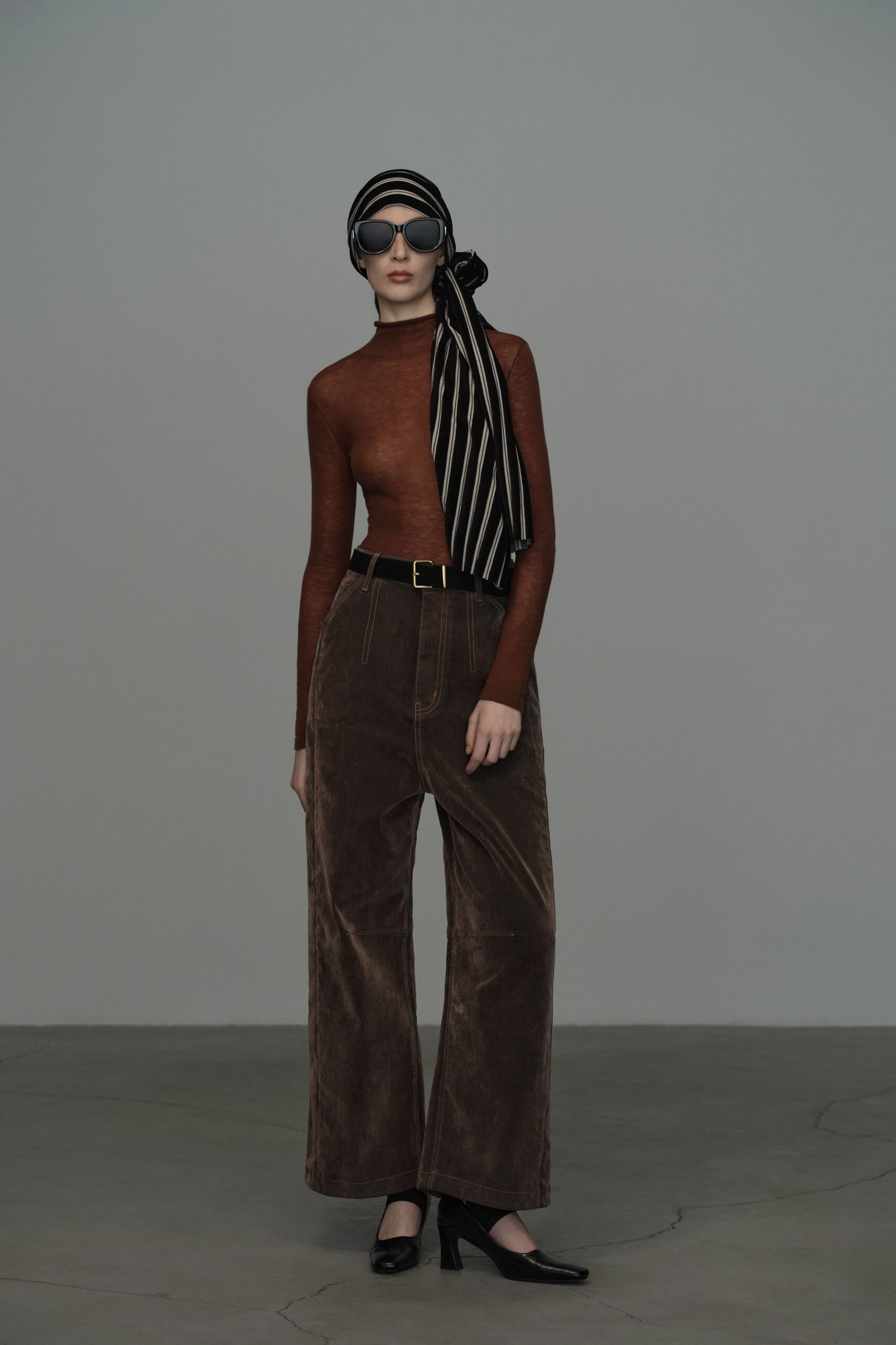 brown fitted top with wide-leg pants