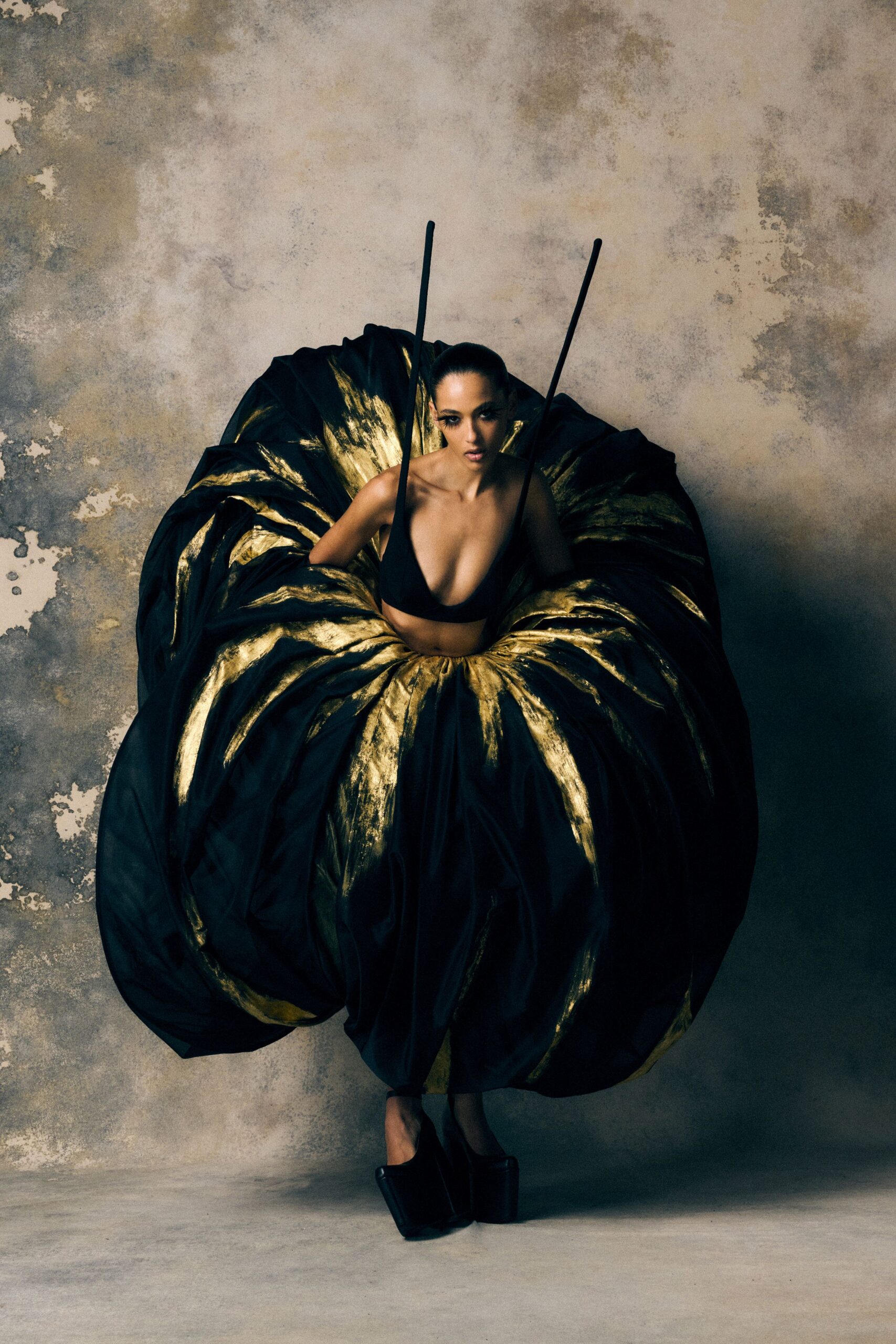 black and gold draped maxi dress
