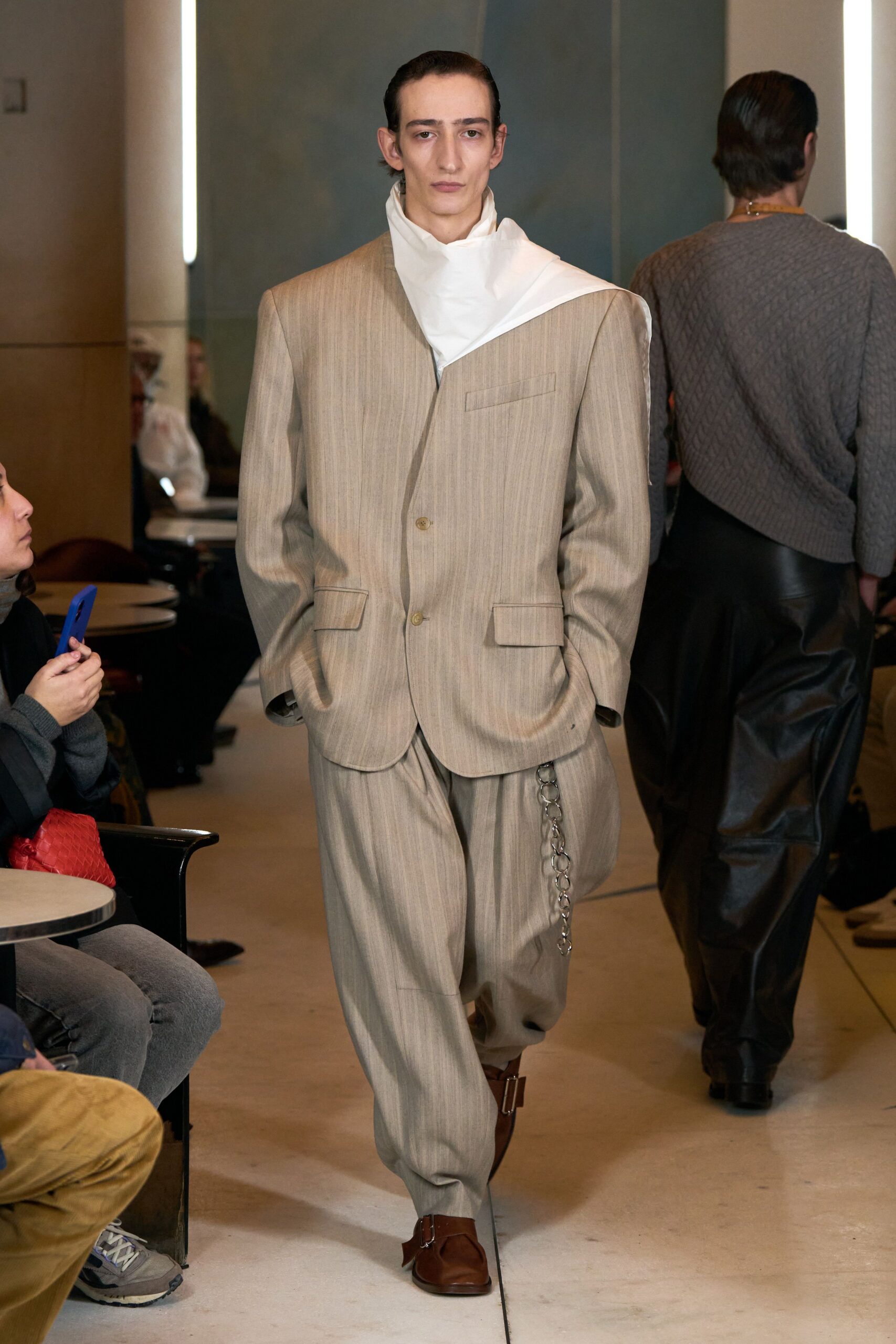 beige striped suit with scarf