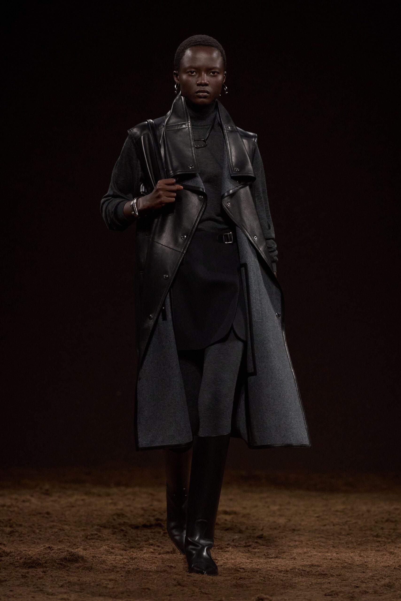 black leather long-sleeve collared fitted layered zippered coat