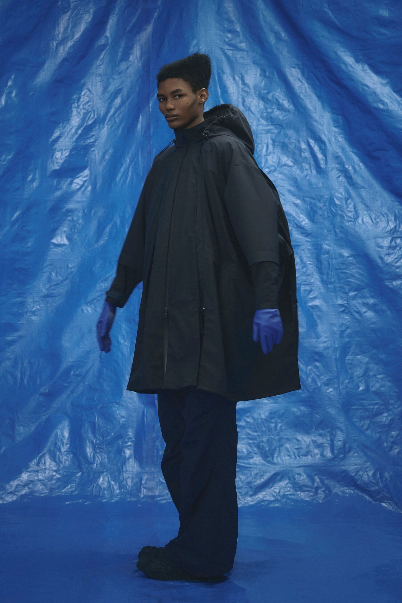 black vinyl hooded oversized poncho