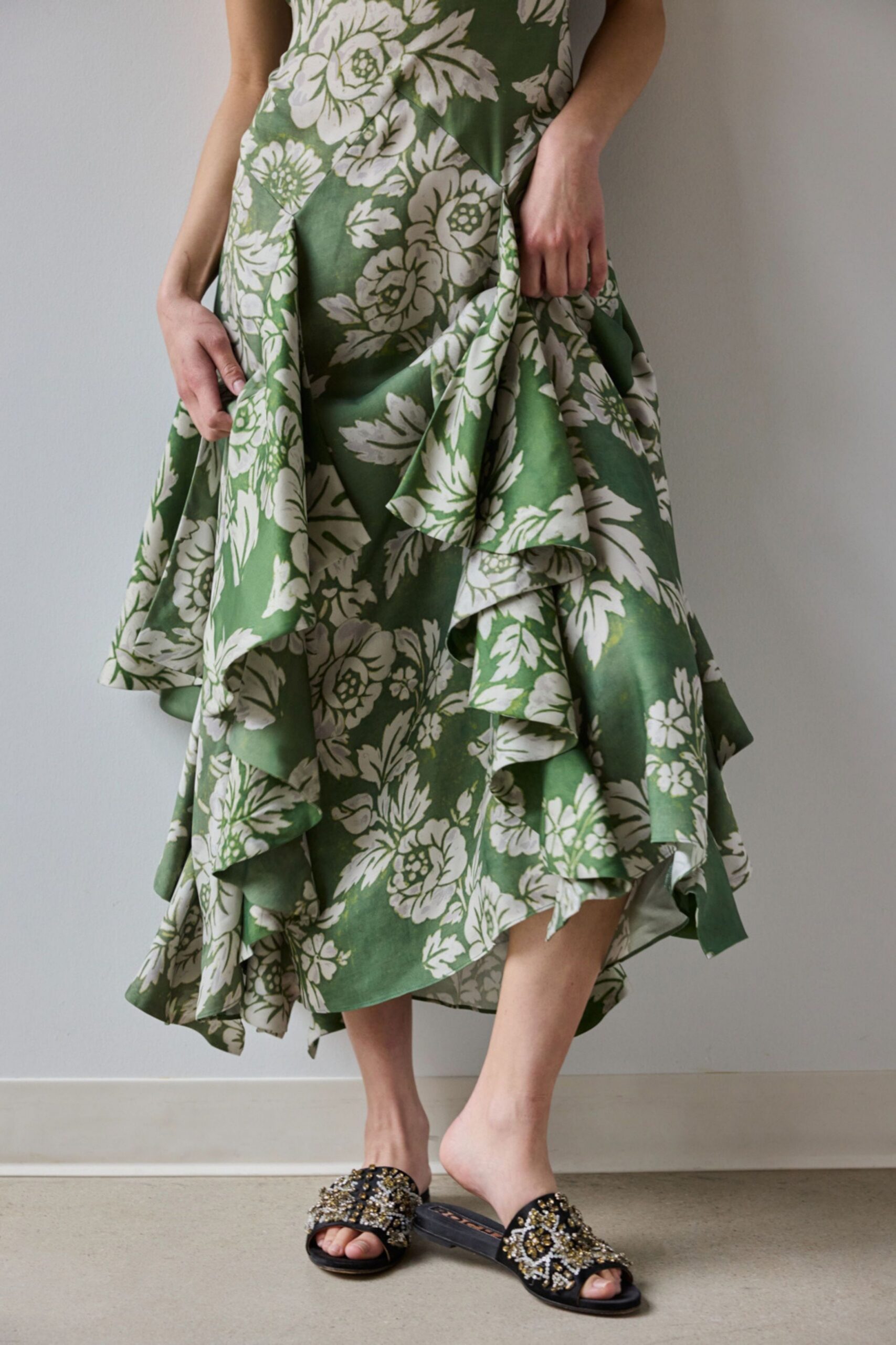 green cotton sleeveless v-neck fitted flared tiered dress