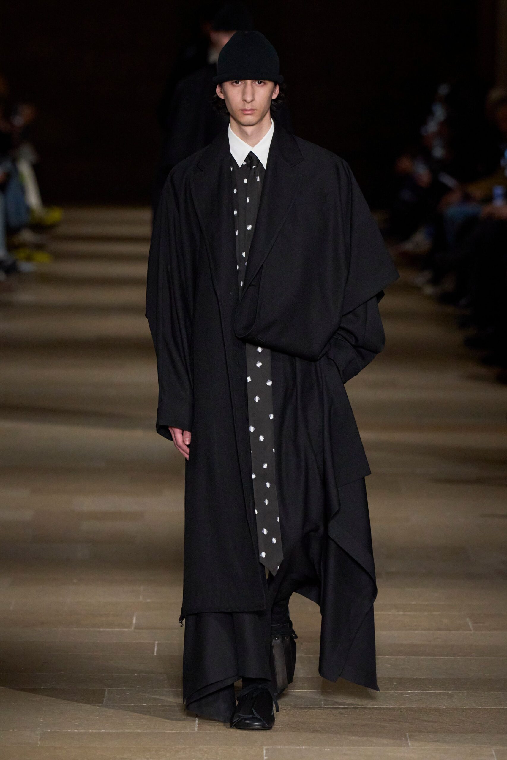 black wool coat with polka-dot shirt