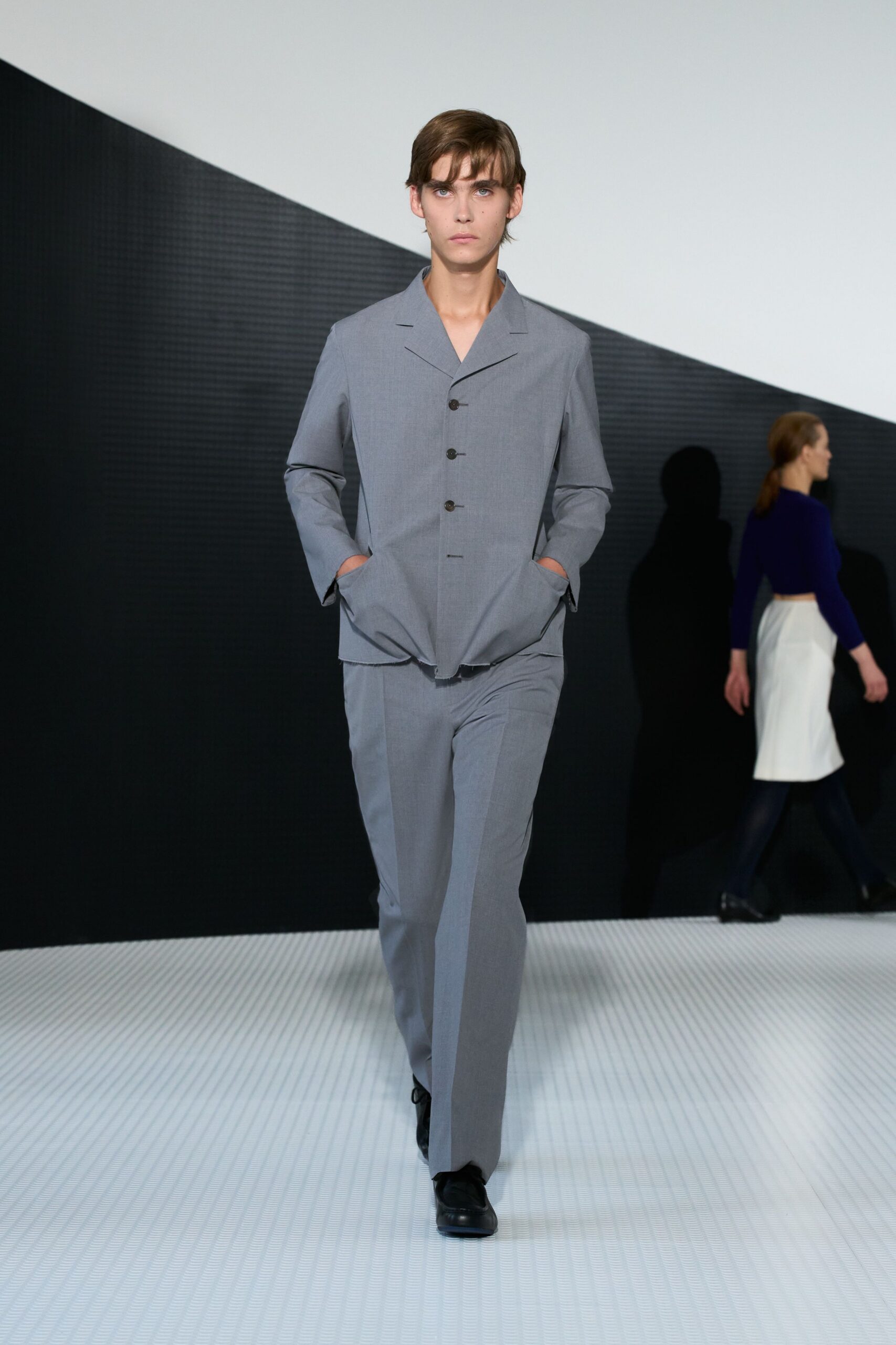 gray tailored suit with black shoes