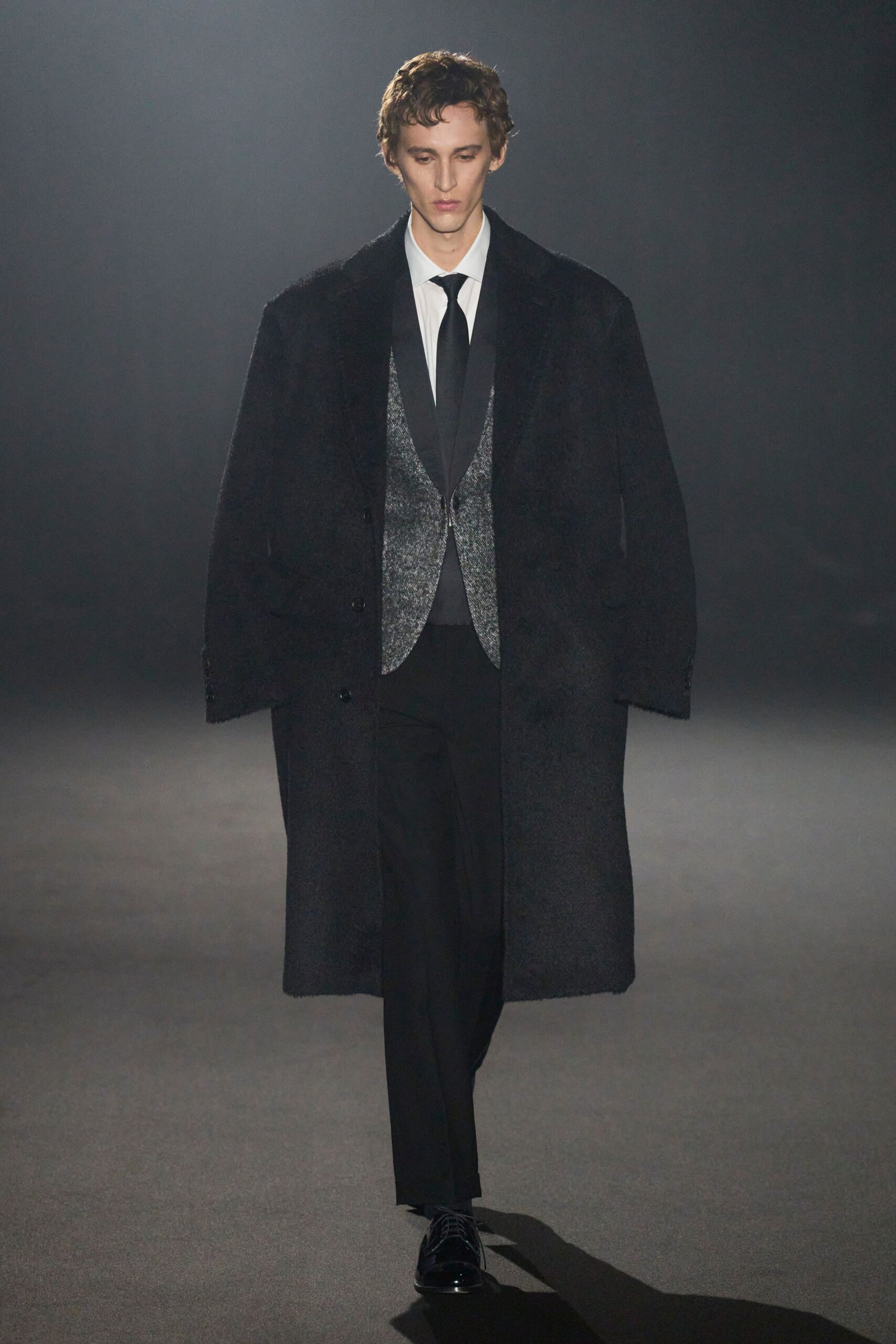 black oversized coat with gray blazer