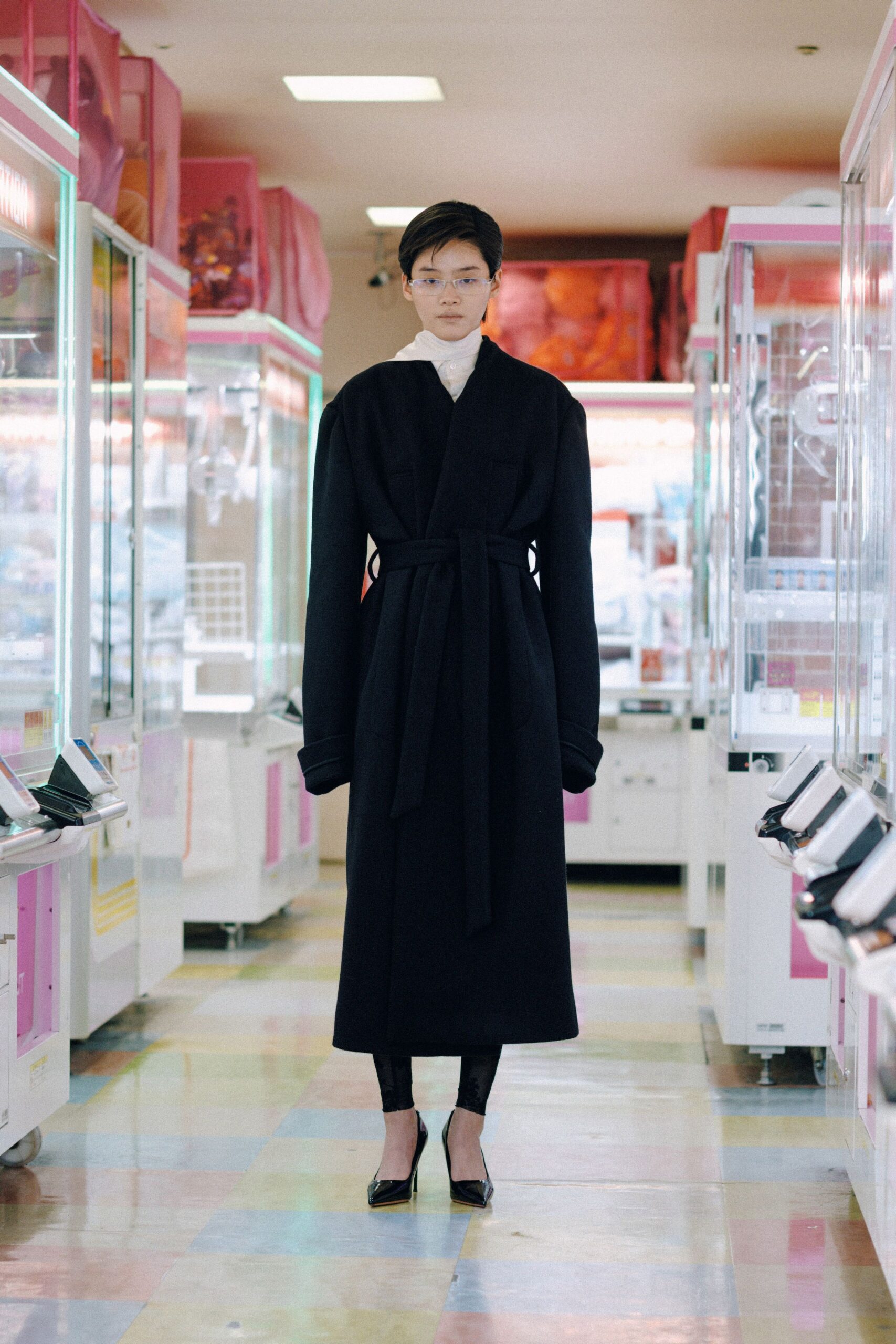 black wool coat with white top