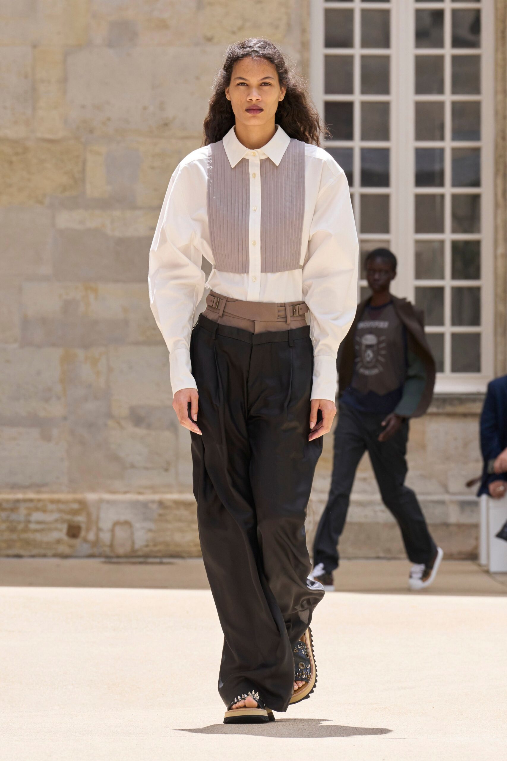 white collared shirt black pants