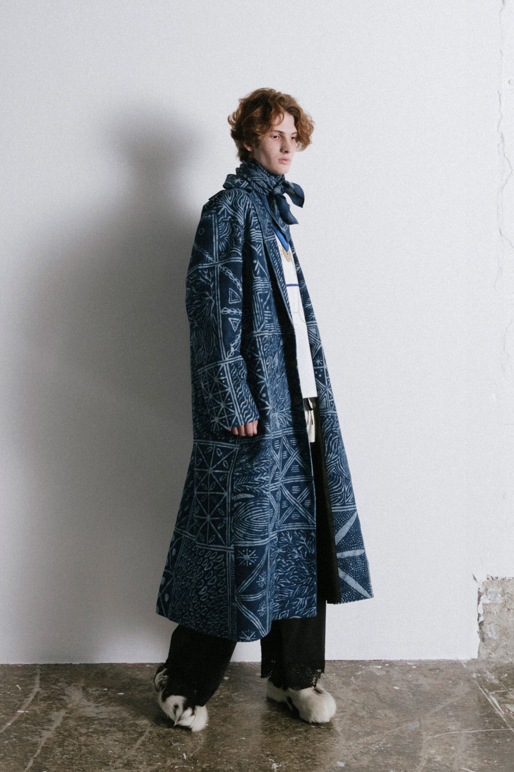 blue printed coat with black pants