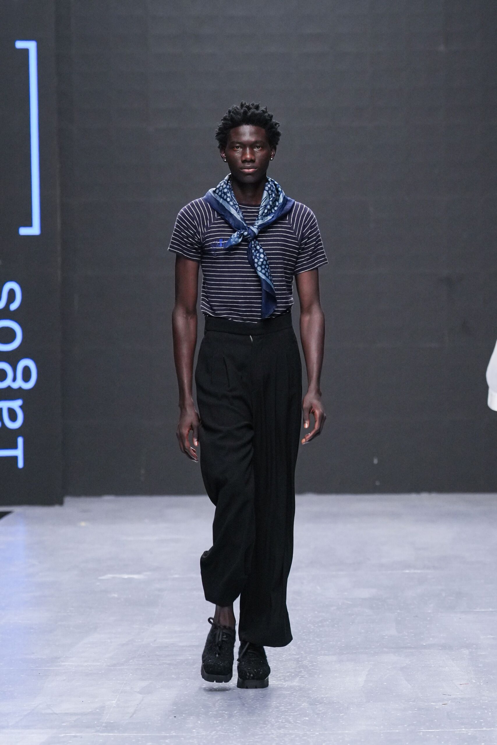 navy striped t-shirt with black pants