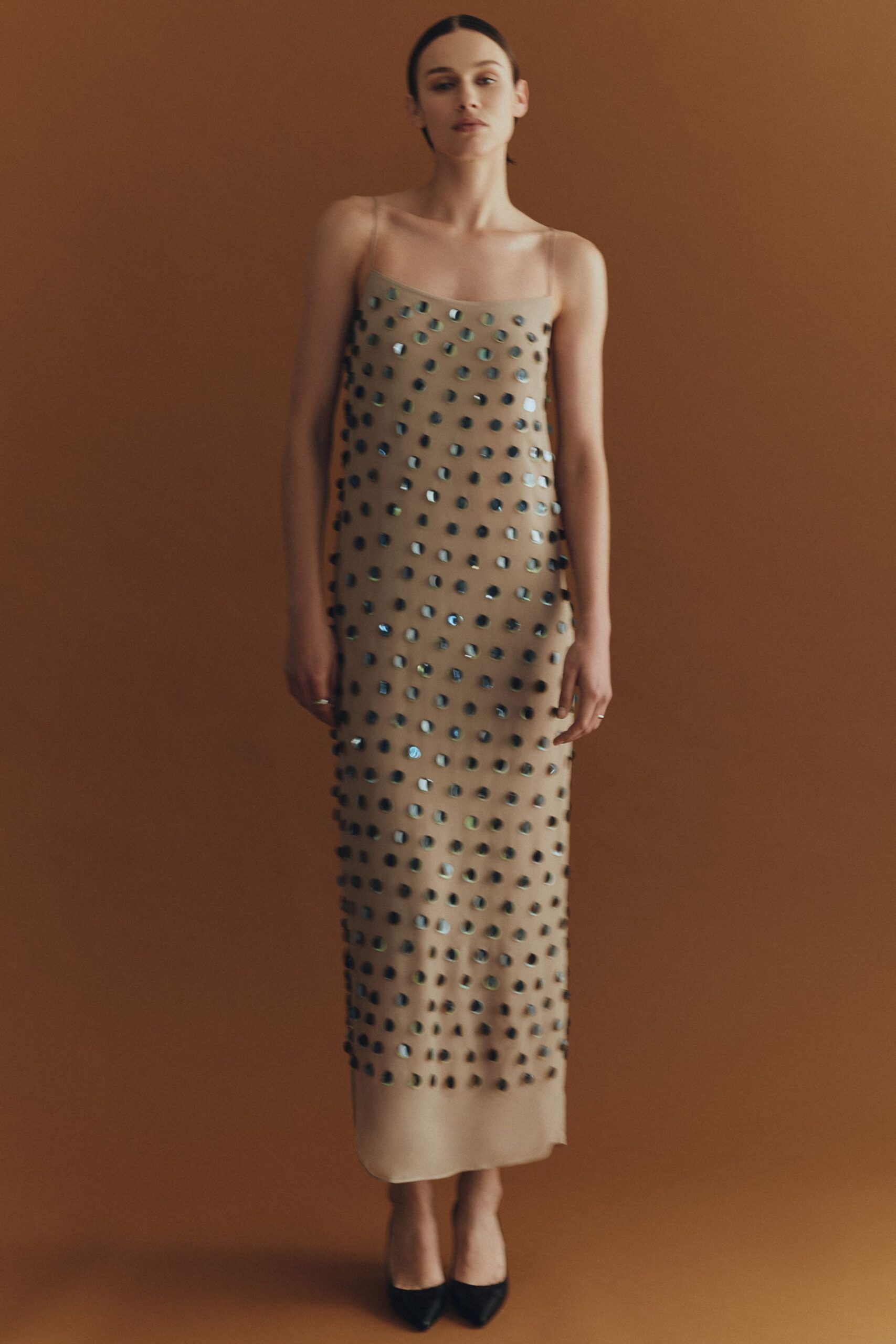 beige silk sleeveless v-neck fitted embellished shiny dress