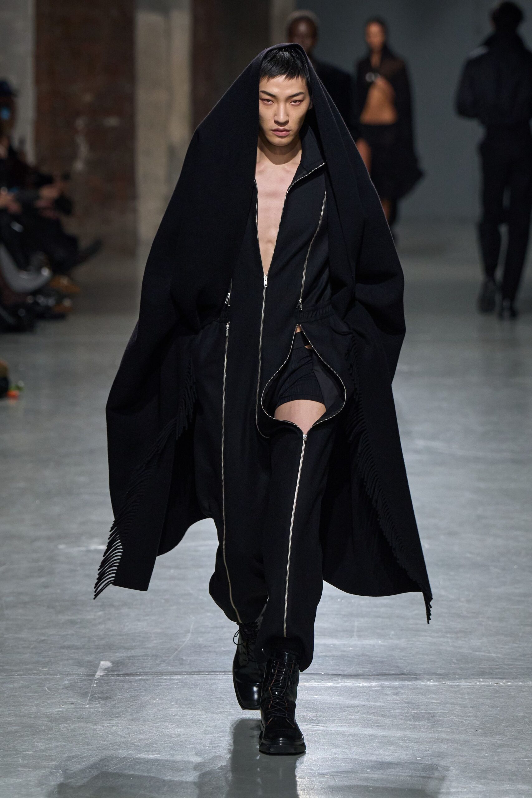 black relaxed jacket and fitted jumpsuit
