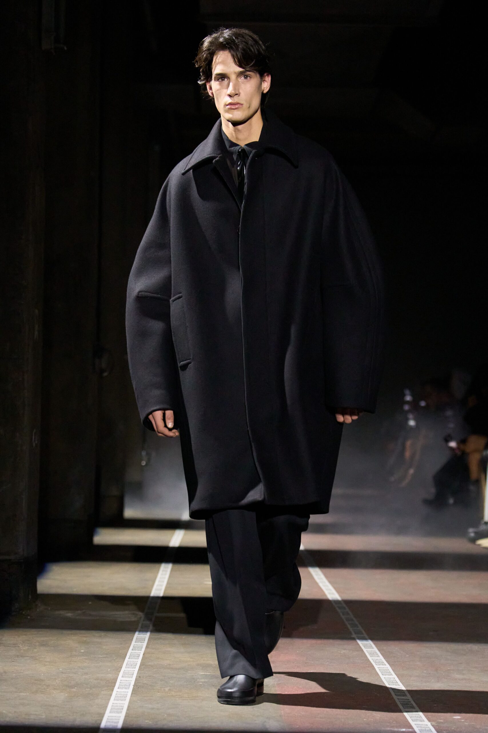 black oversized coat with tailored pants