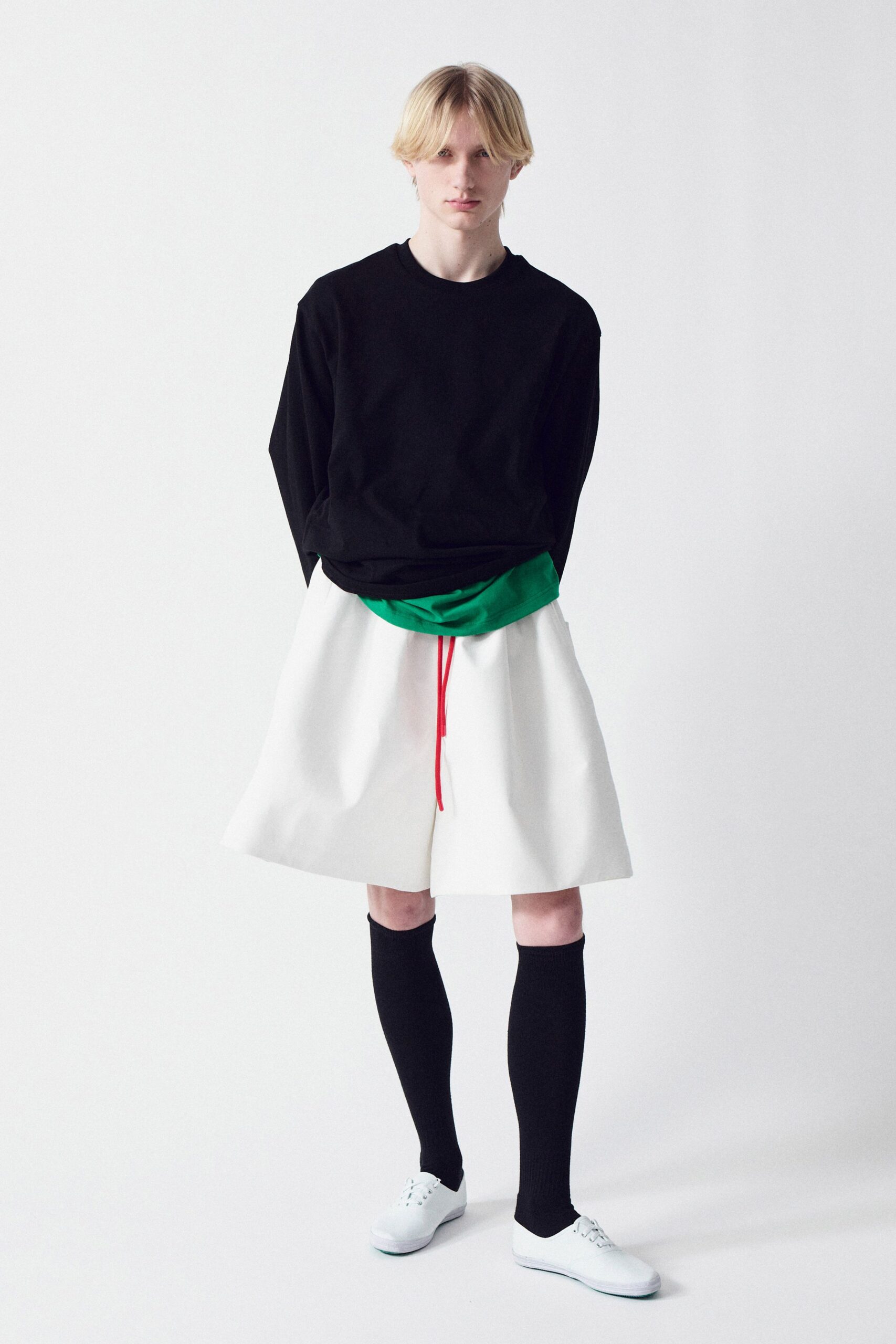 black top white pleated skirt
