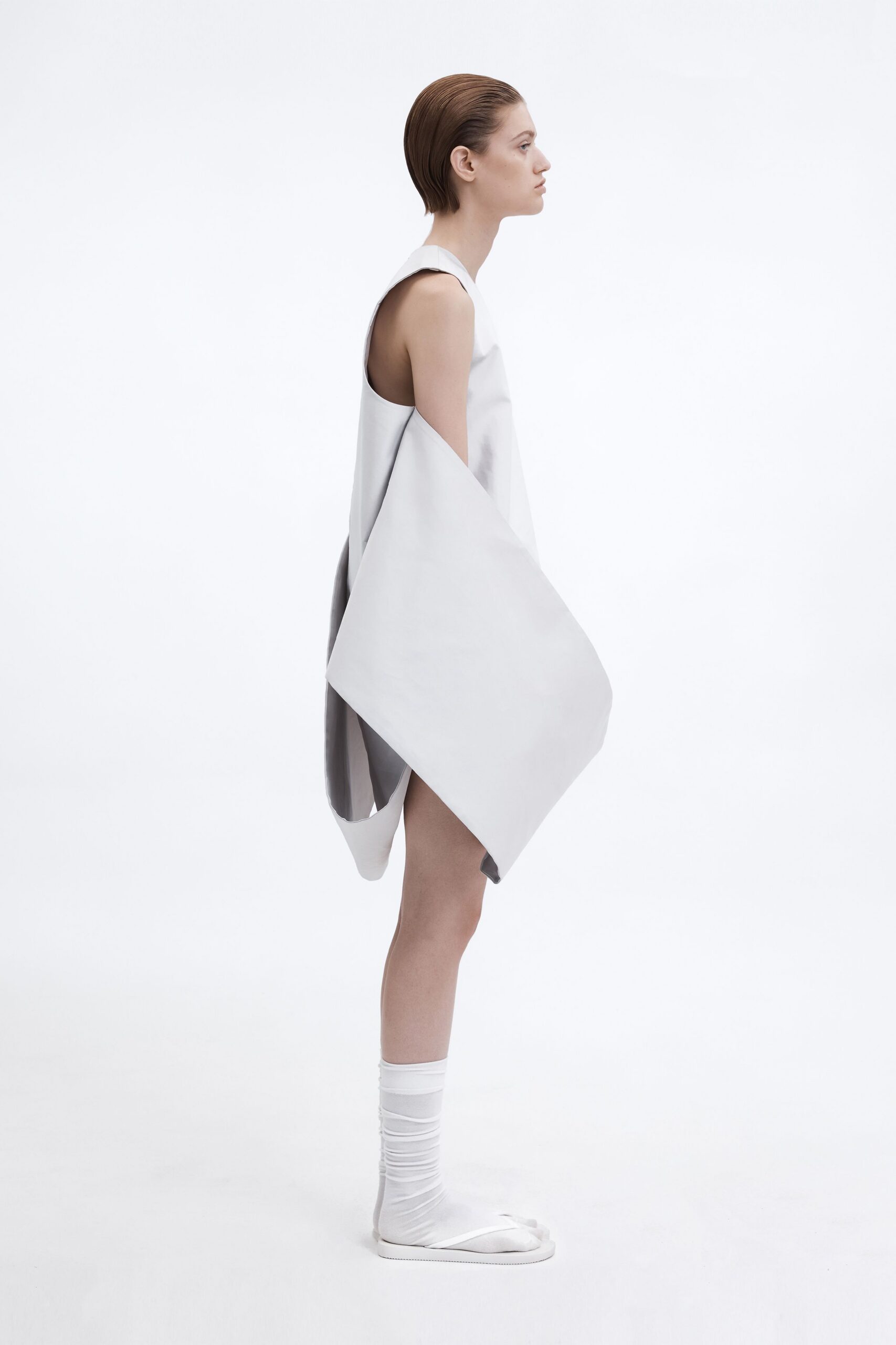 white asymmetric sleeveless dress