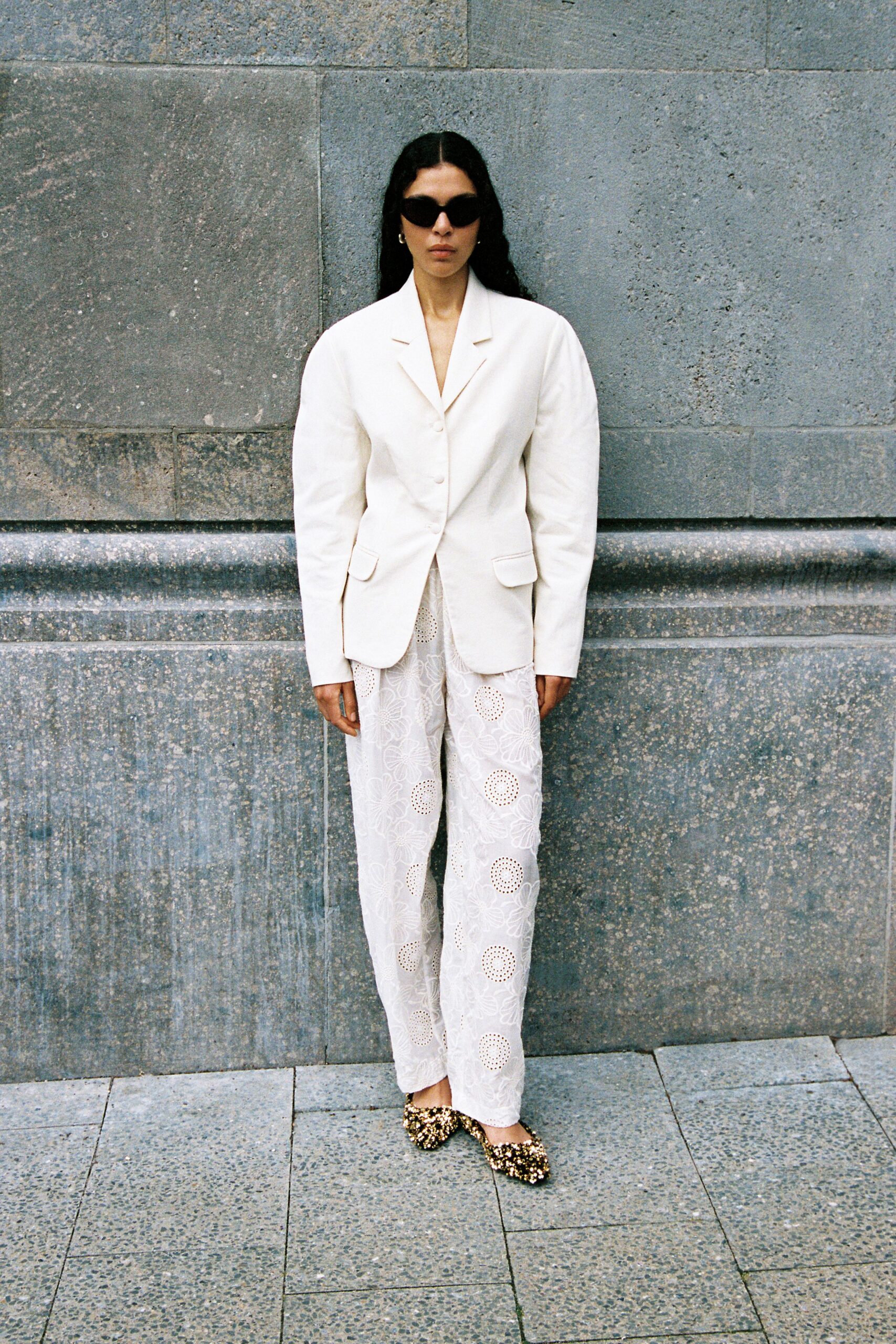 white blazer with embroidered pants
