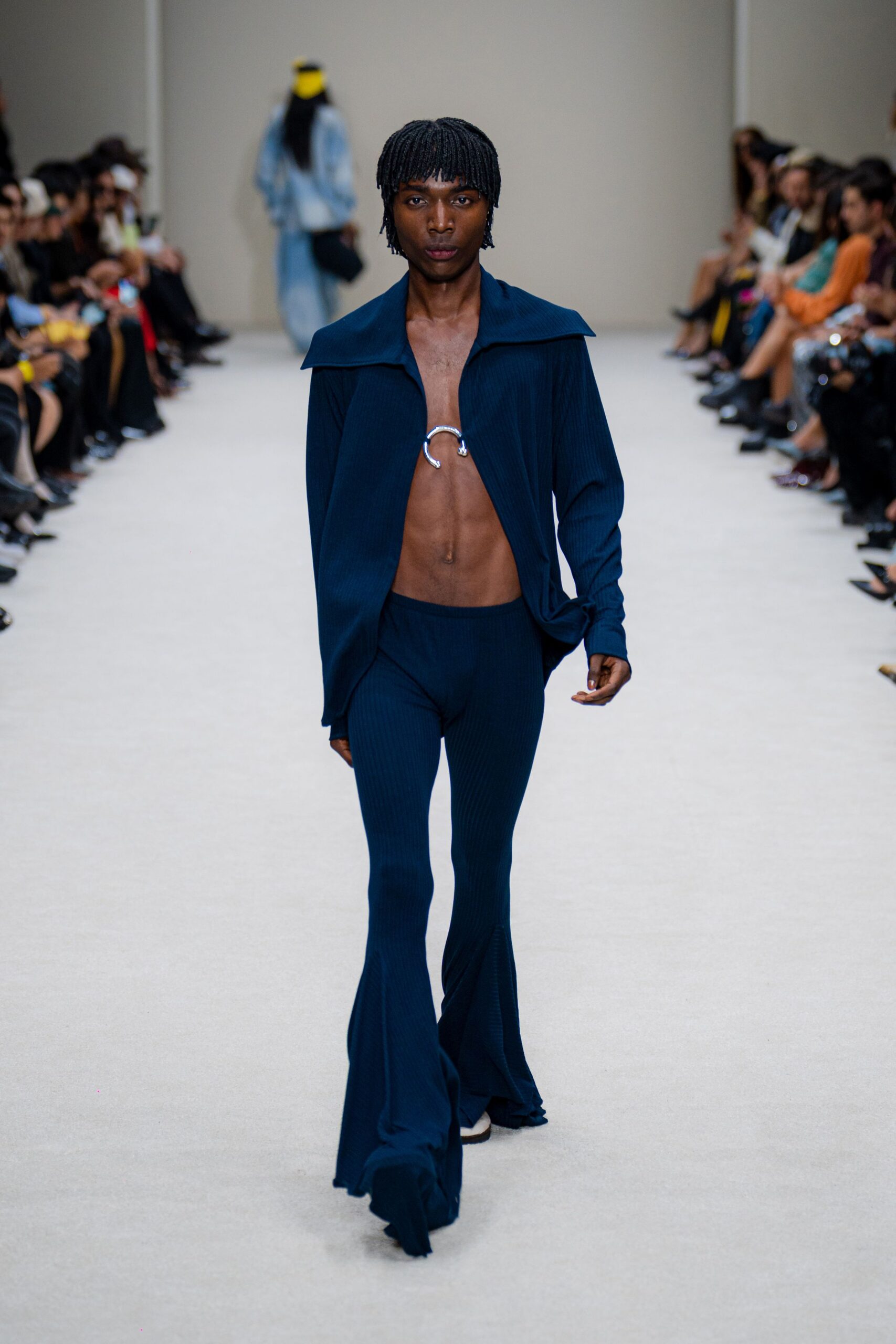 blue fitted top and flared pants
