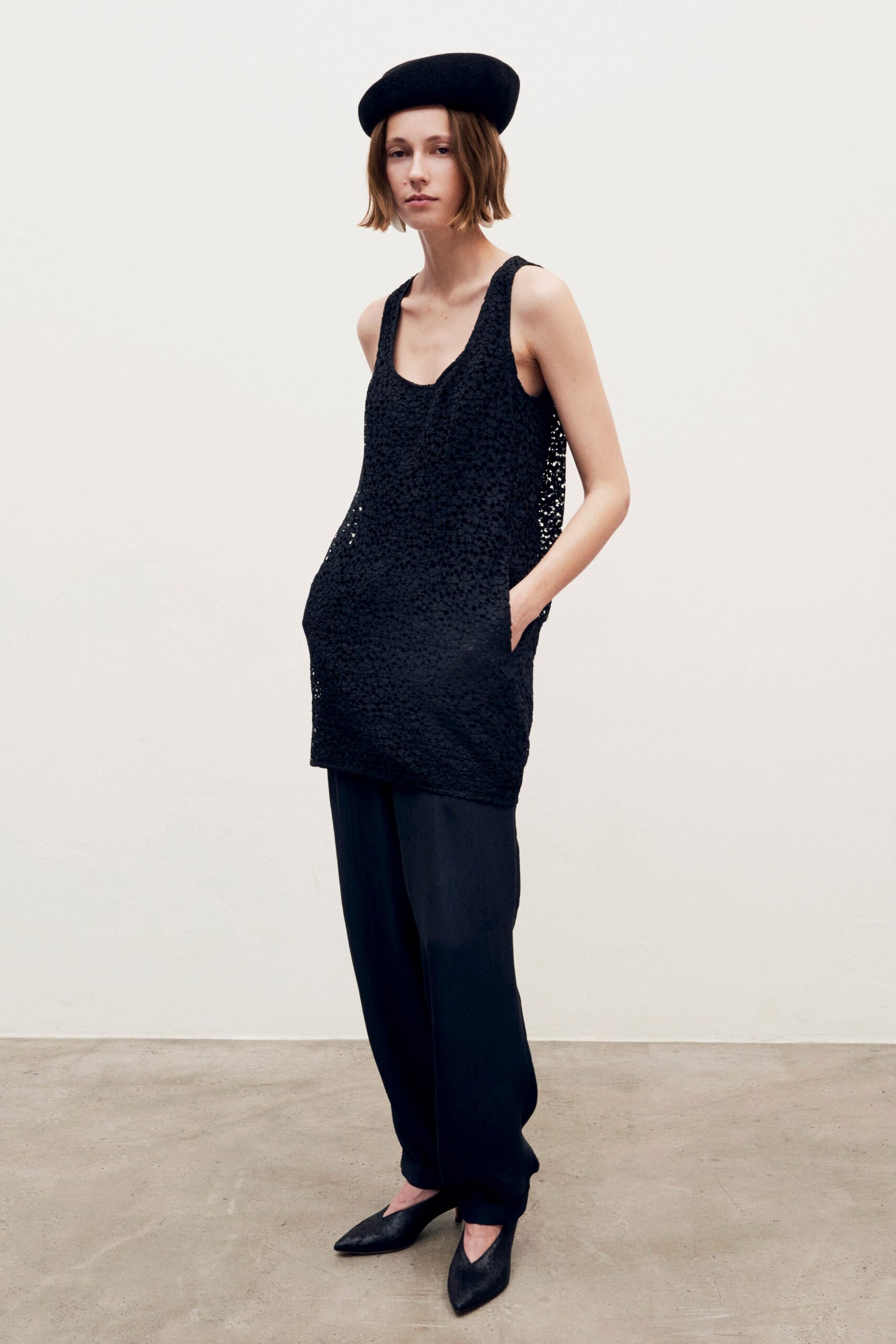 black cotton sleeveless v-neck relaxed layered pockets tank-top