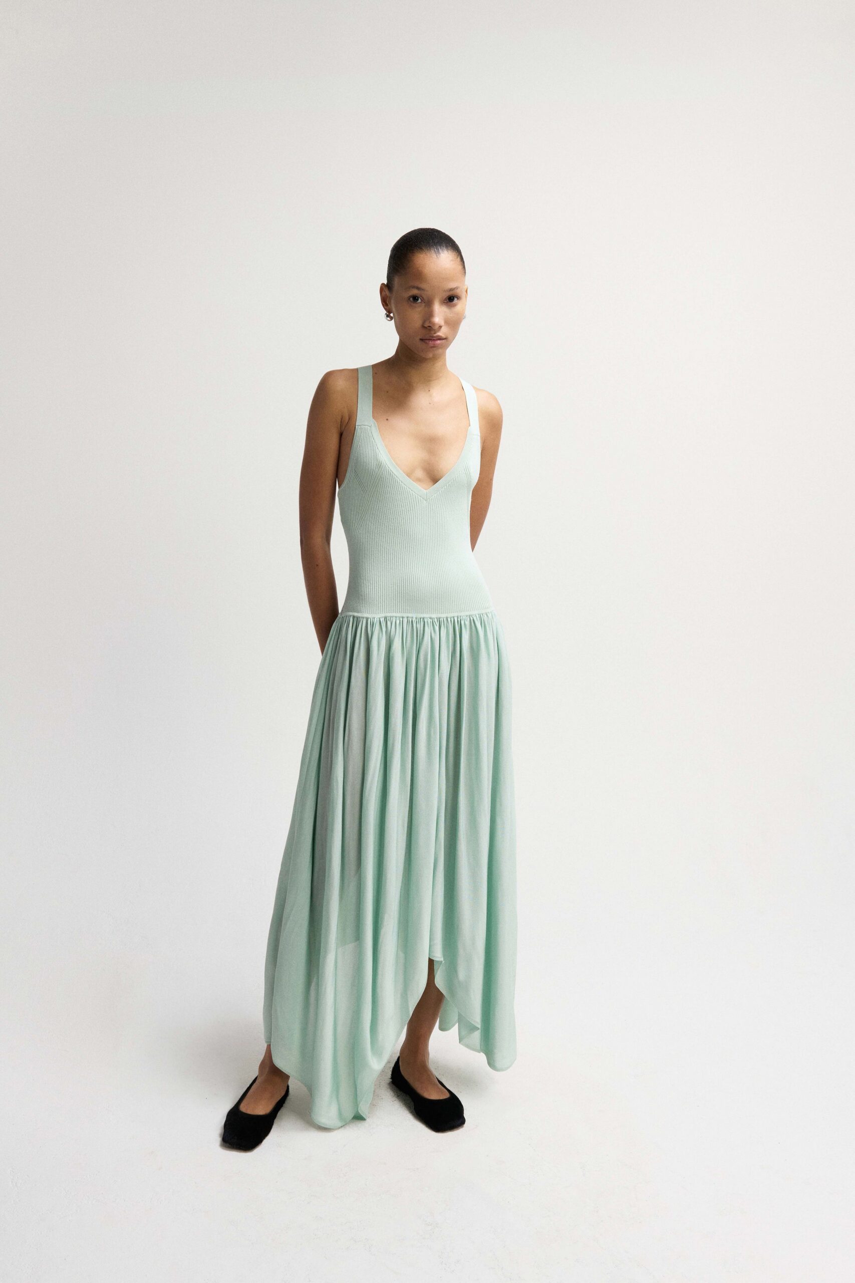 green silk sleeveless v-neck fitted draped flowing dress